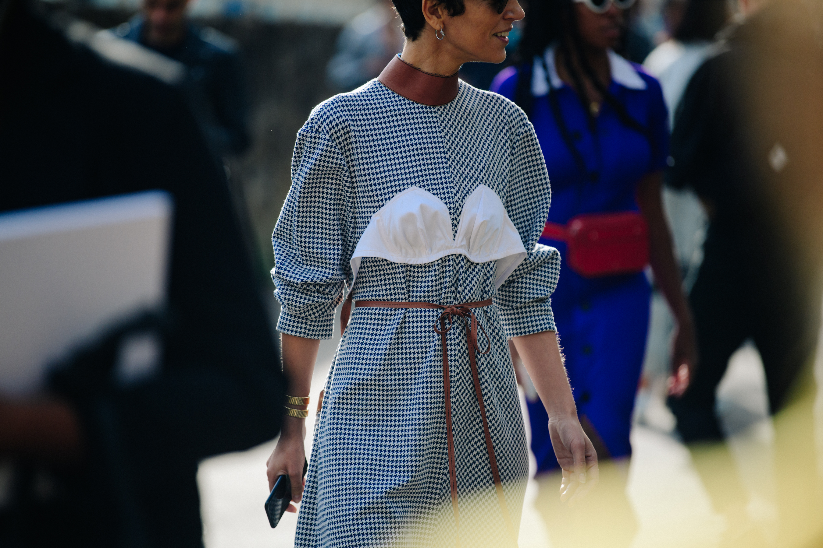 Woman wearing white check dress