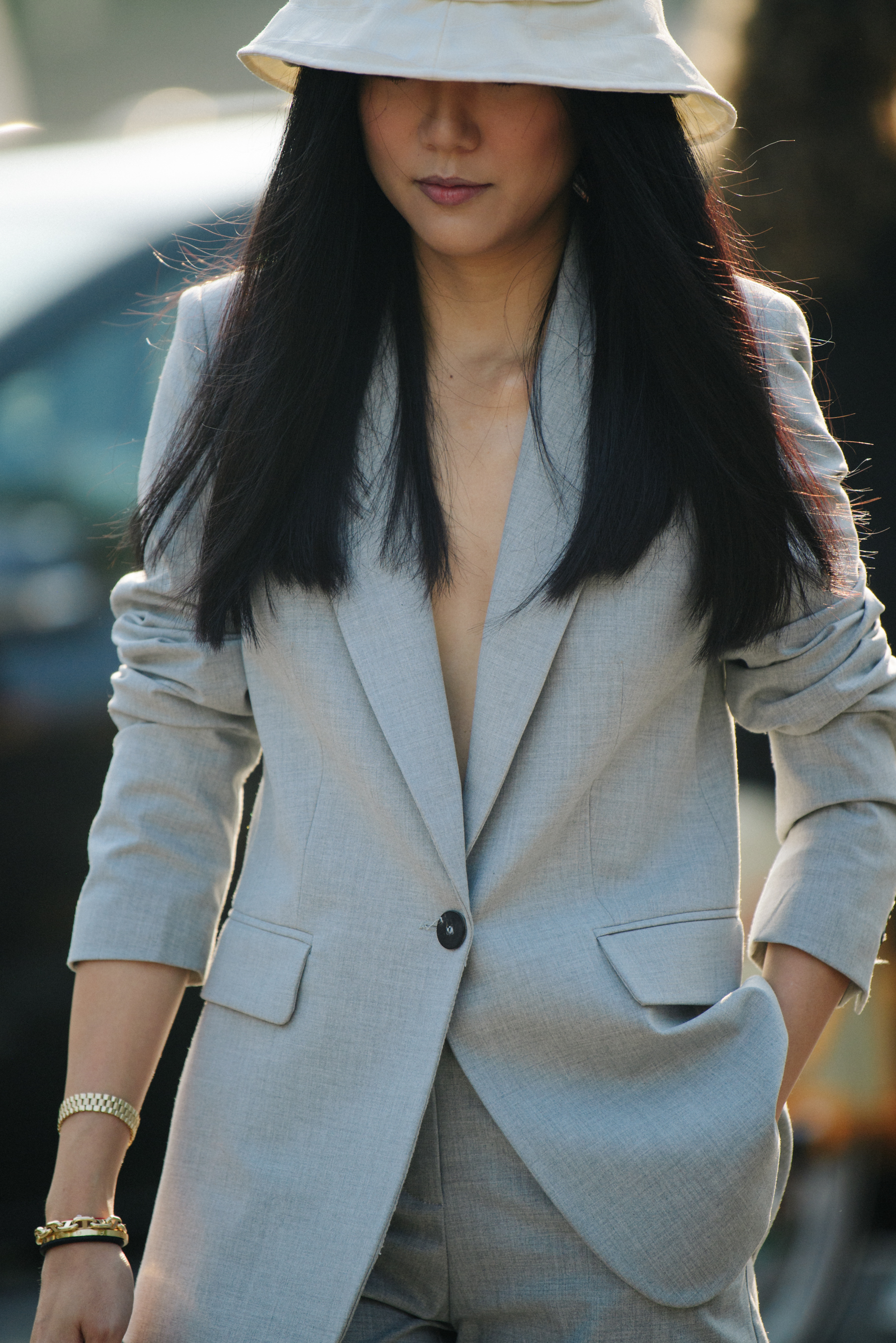 Woman wearing grey suit jacket