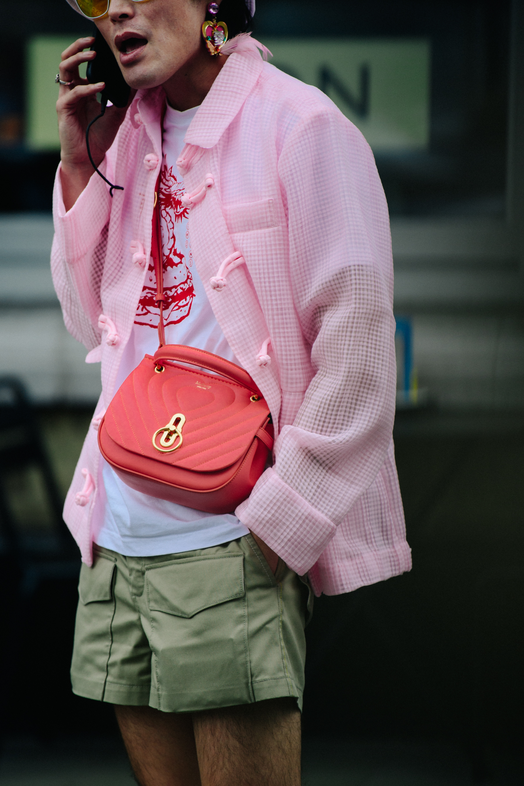 Man wearing pink jacket