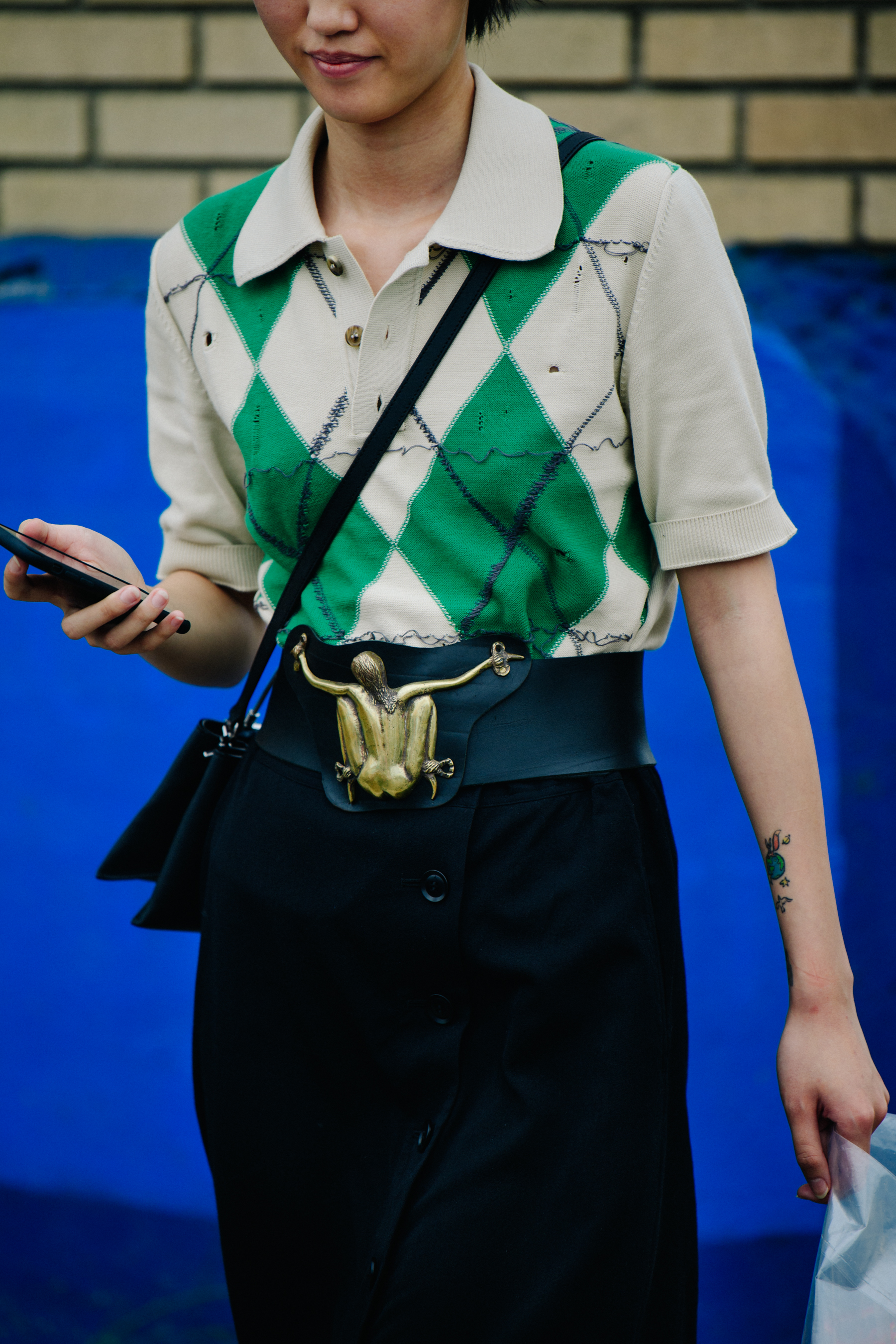 Chinese model wearing green top