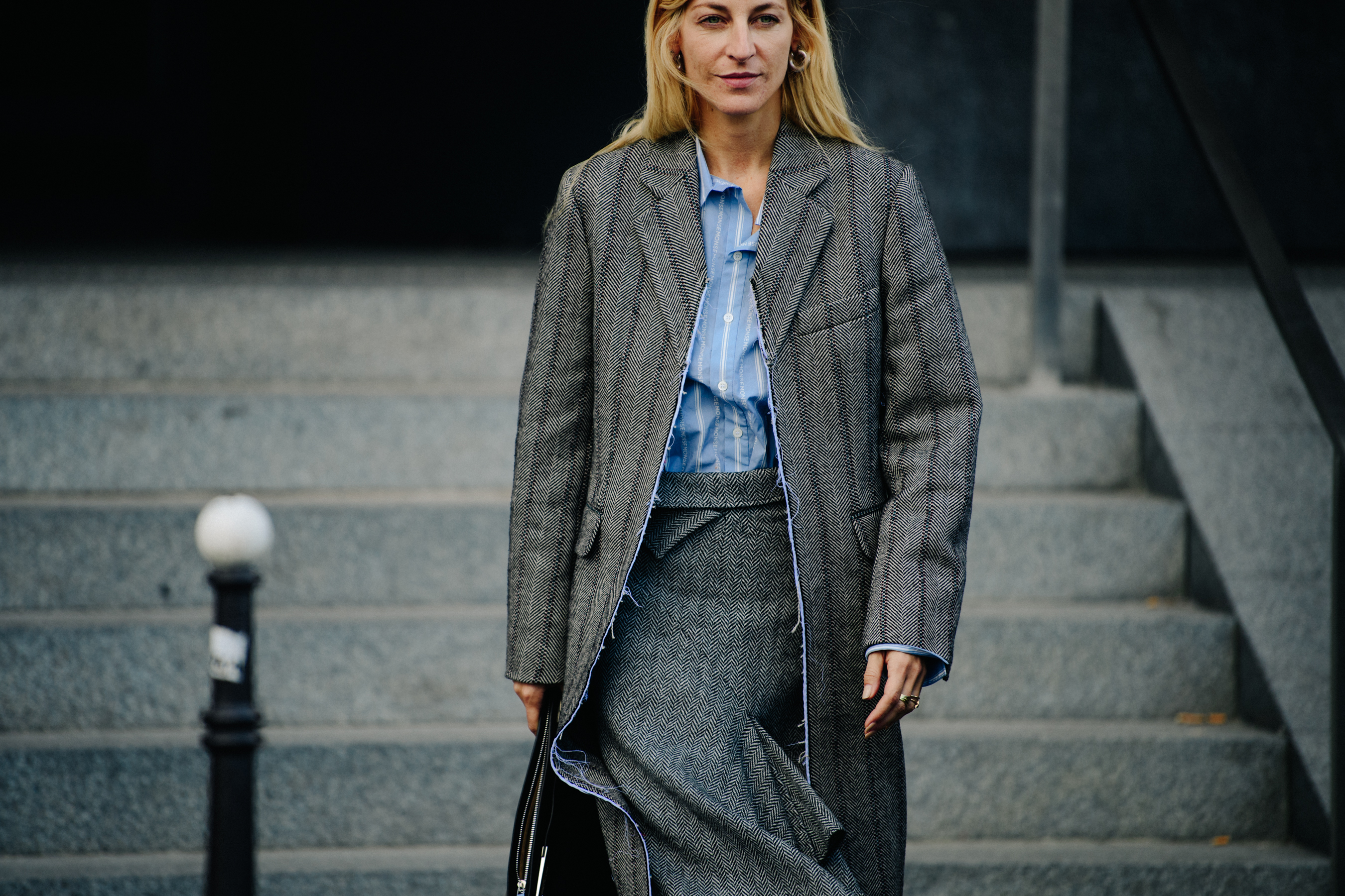 Woman wearing grey suit
