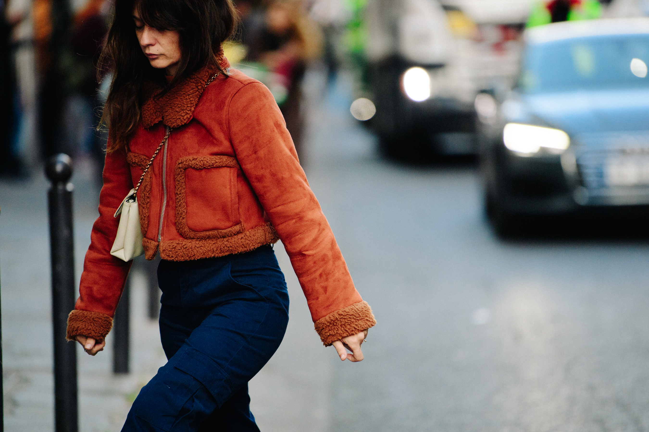 Woman wearing orange coat