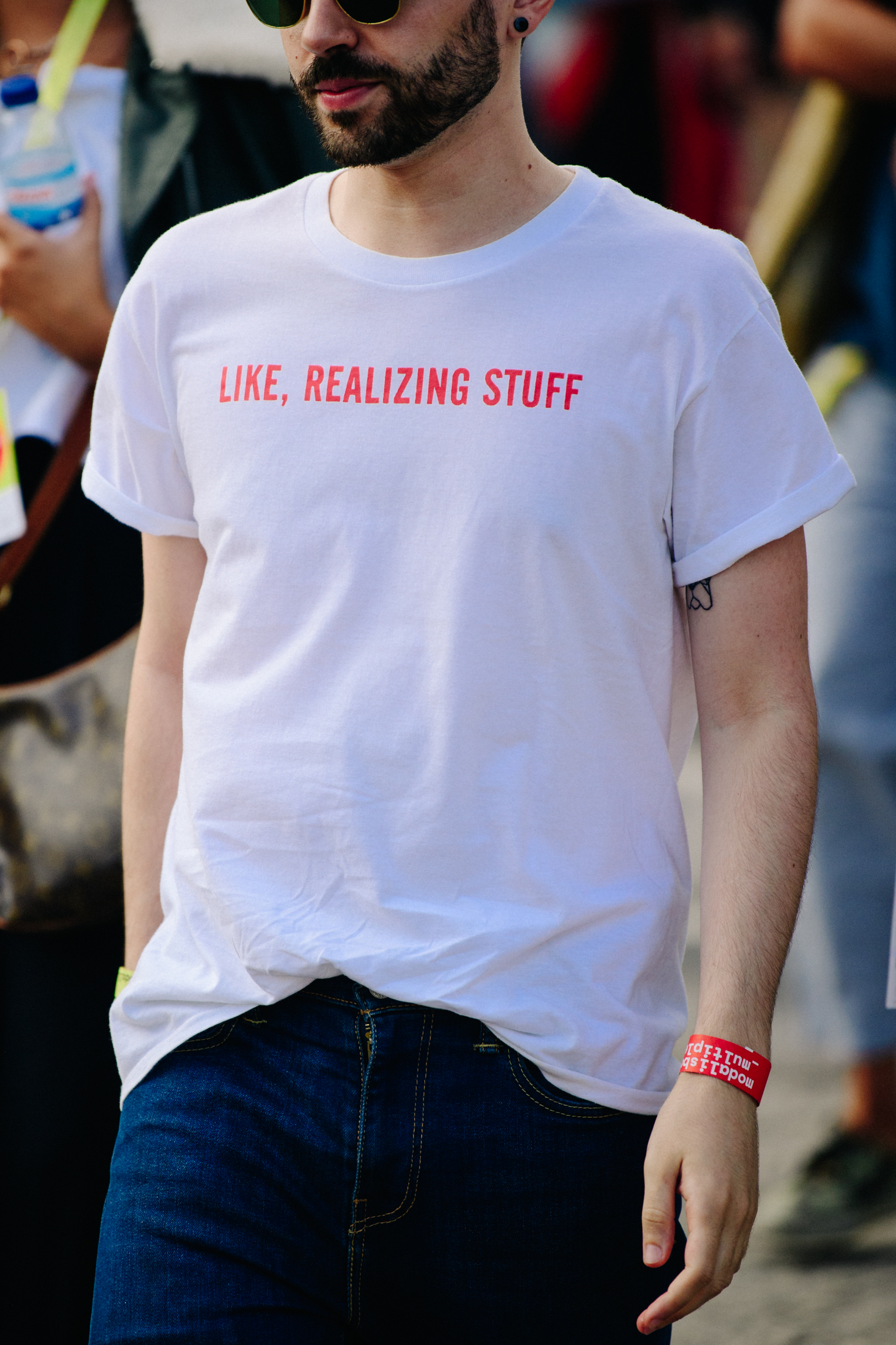 Man wearing slogan tee shirt
