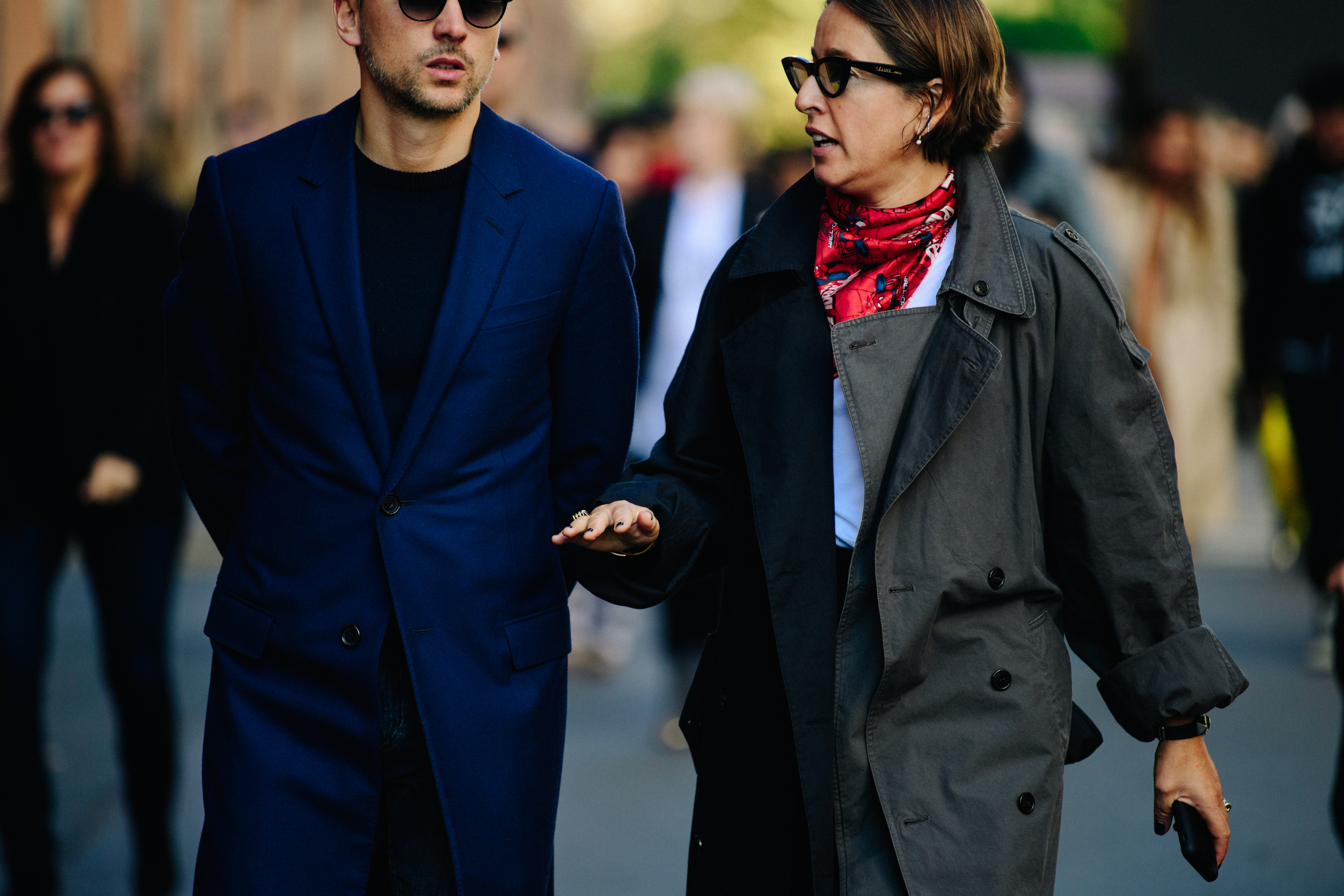 Couple wearing smart winter clothing