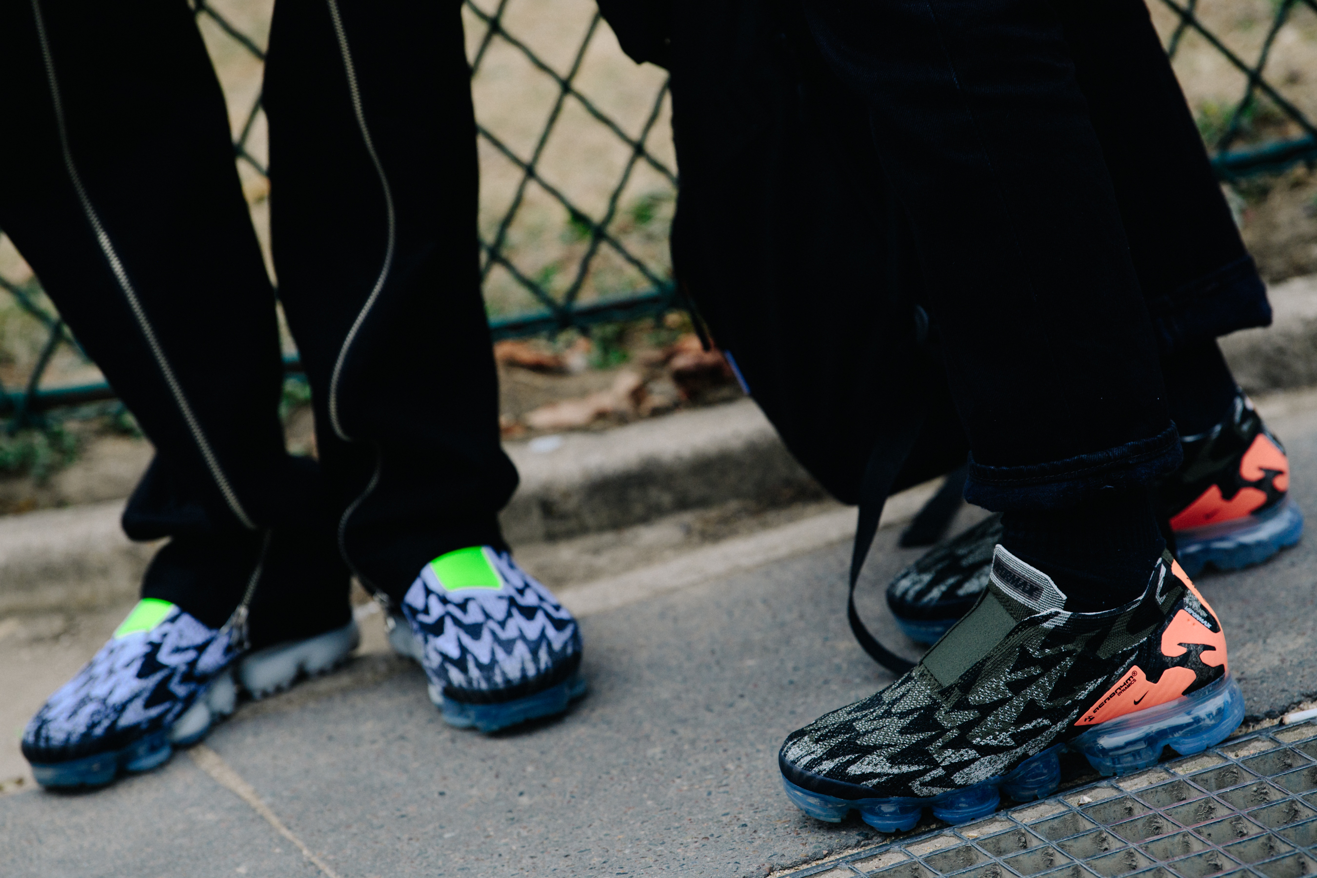 Two men wearing Nike x Acronym sneakers
