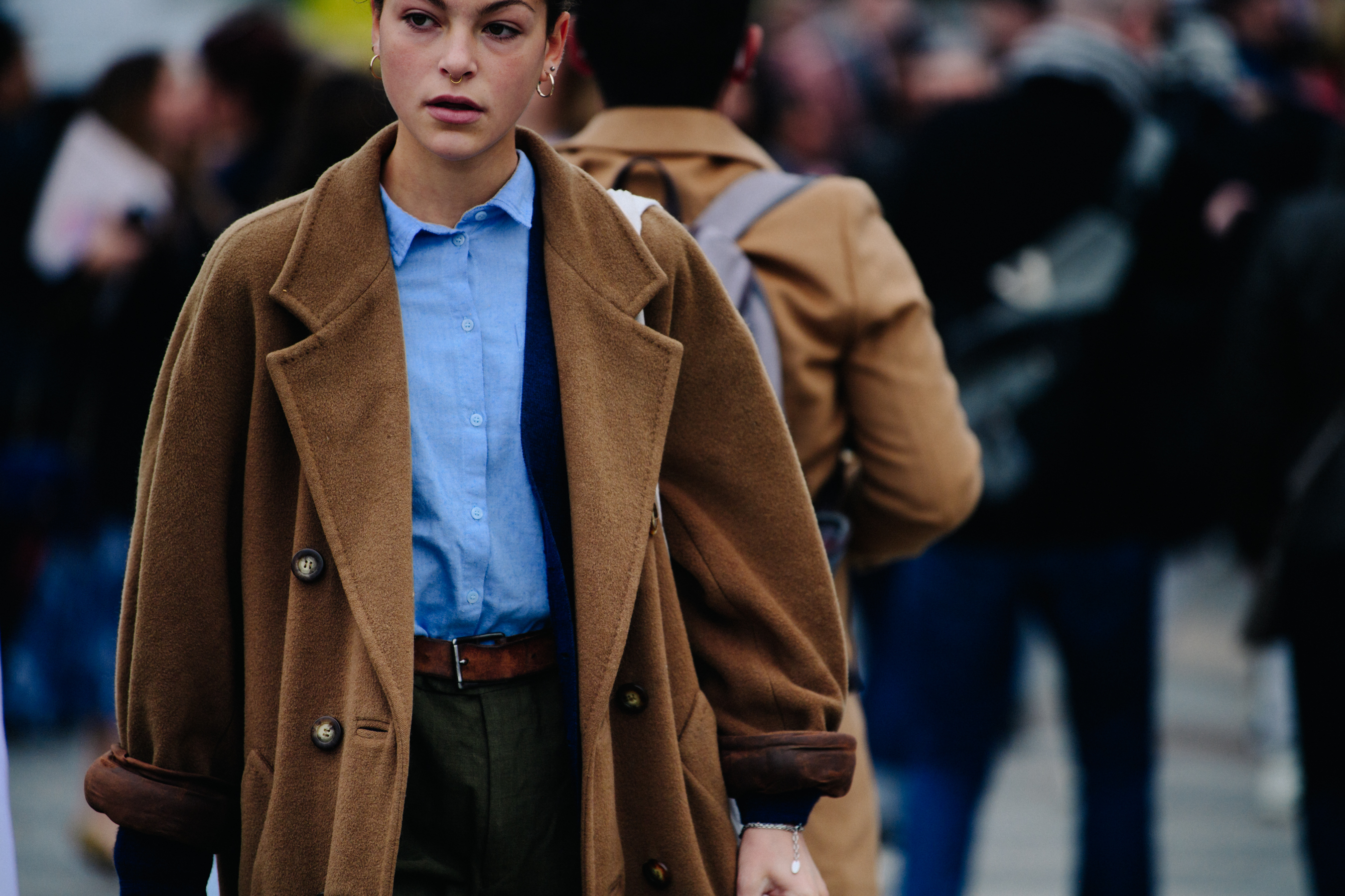 Woman wearing black wool coat