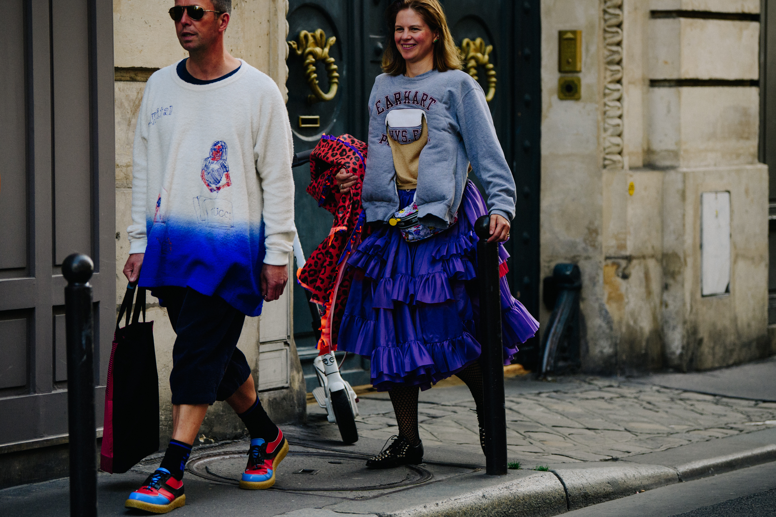 Couple wearing colourful outfits