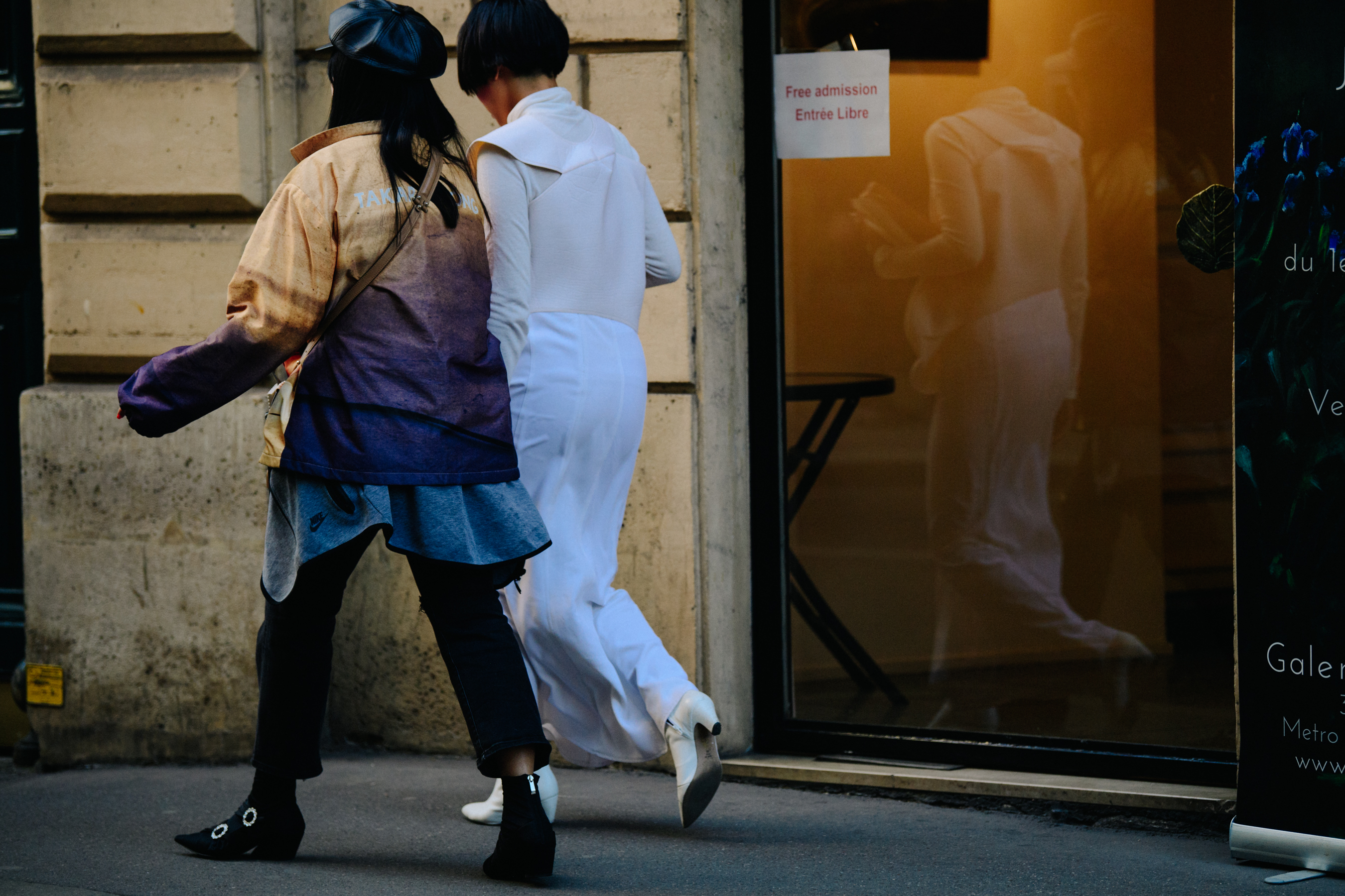 Two women wearing heels