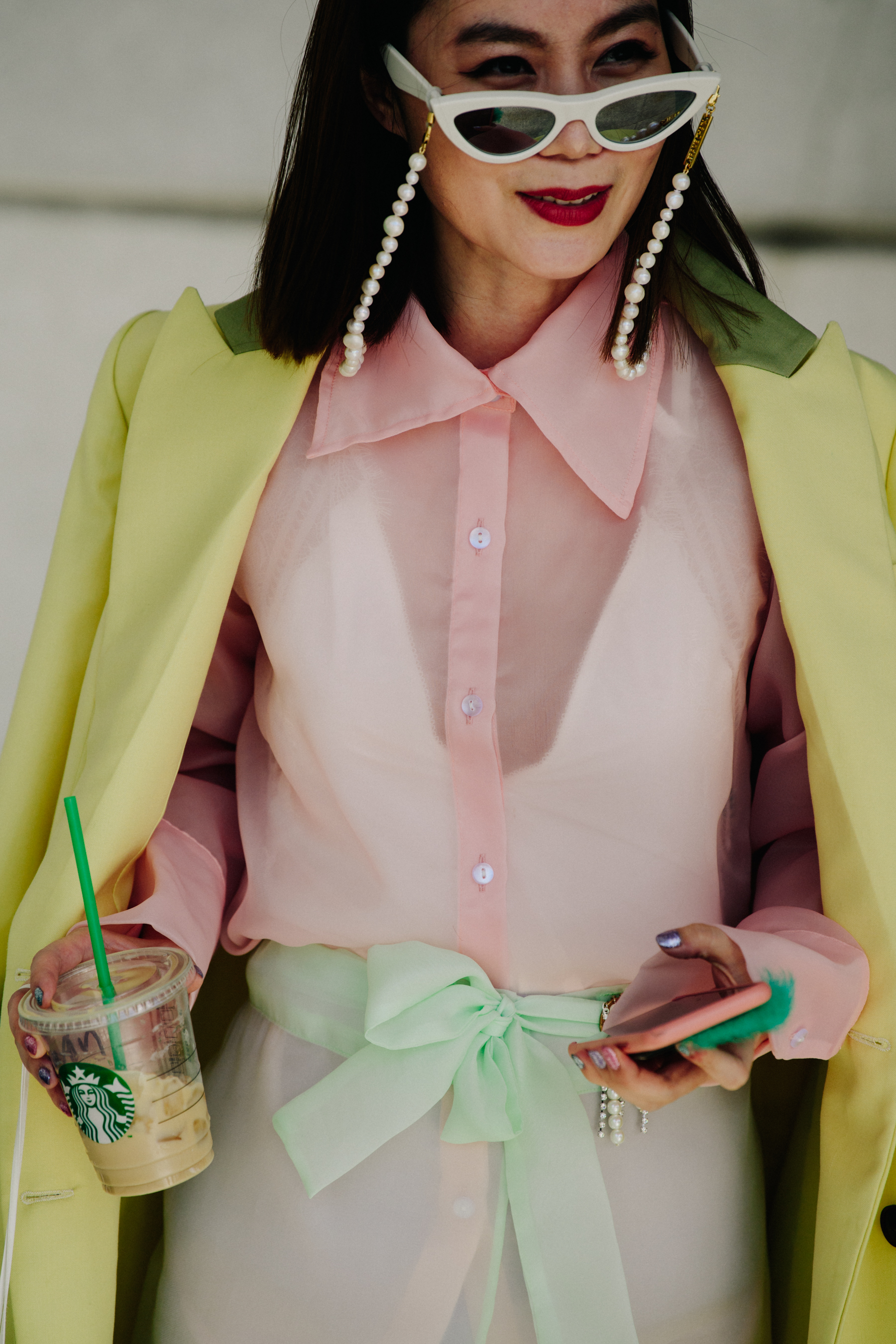 Woman wearing pink and yellow