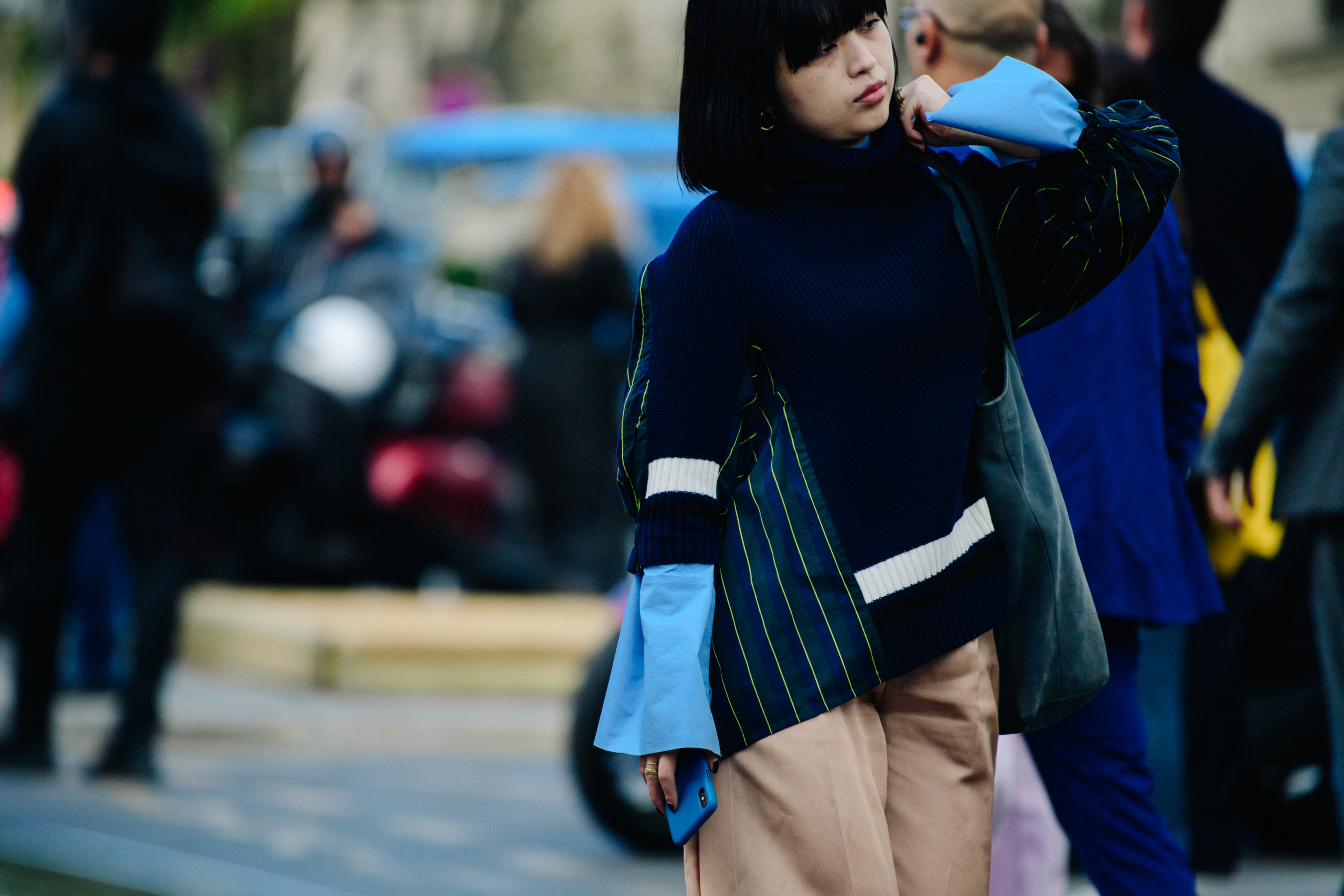 Woman wearing blue jumper