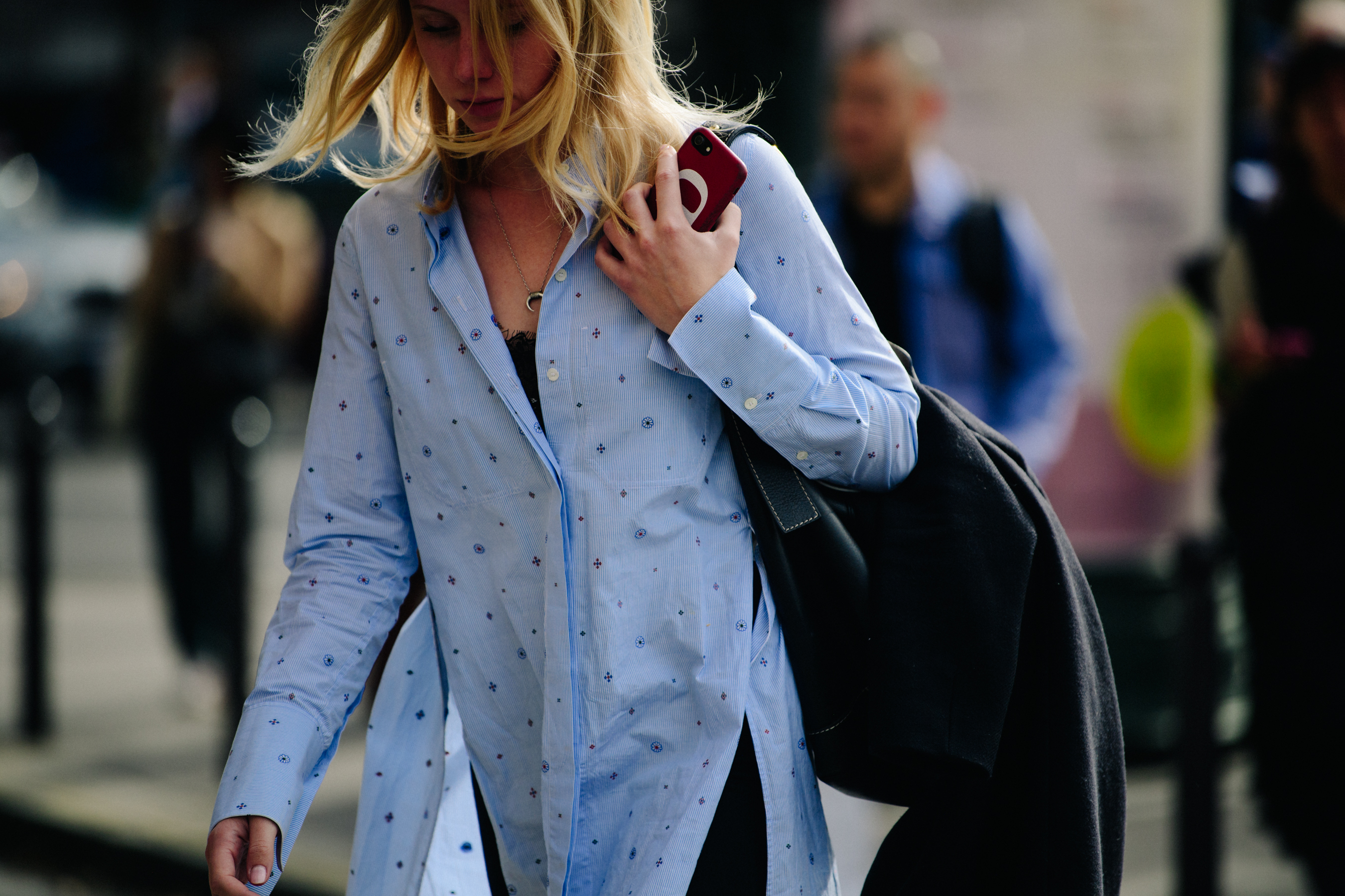 Woman wearing pattern blue shirt