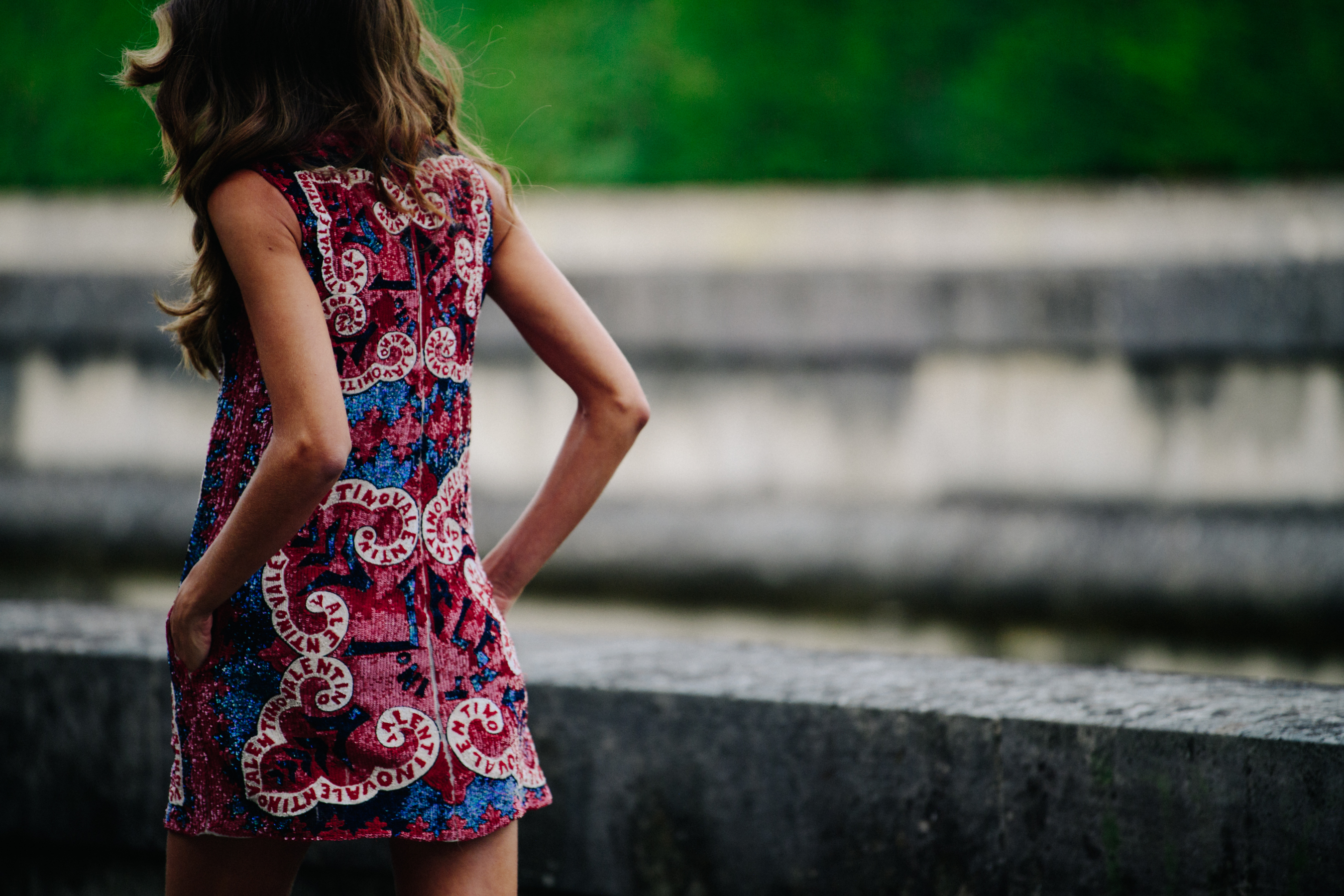 Woman wearing Valentino dress