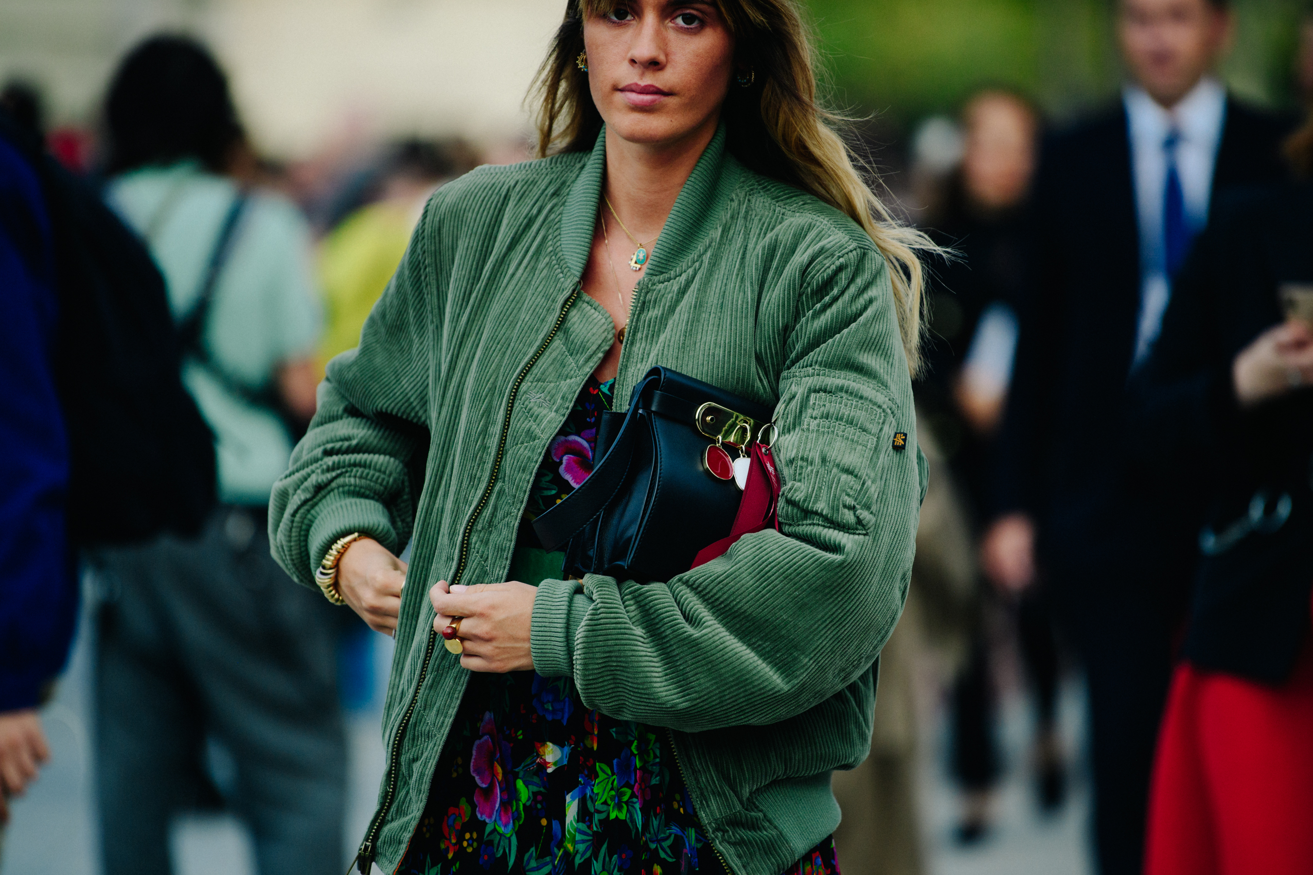 Woman wearing green jacket