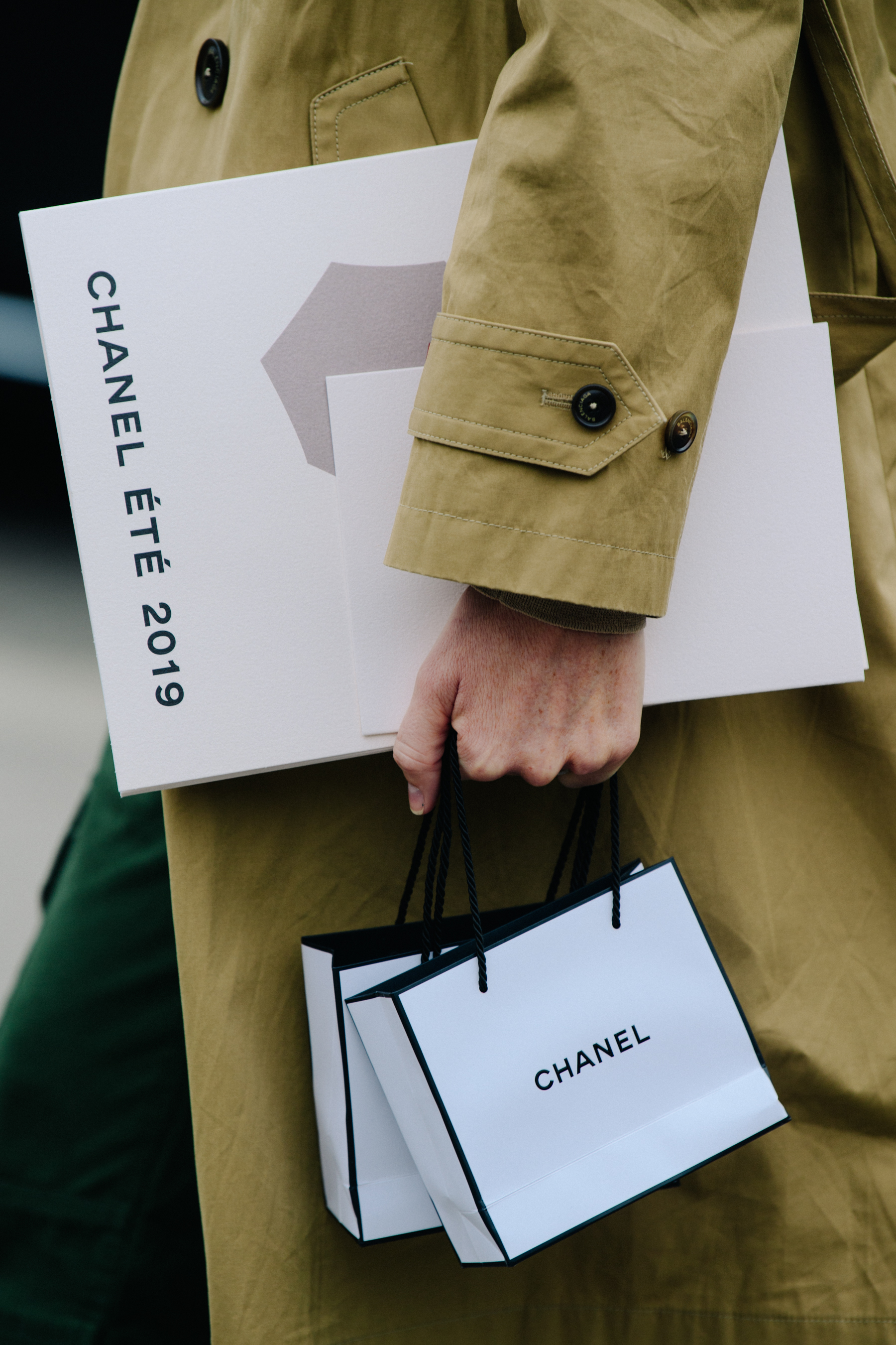 Woman wearing tan trench coat