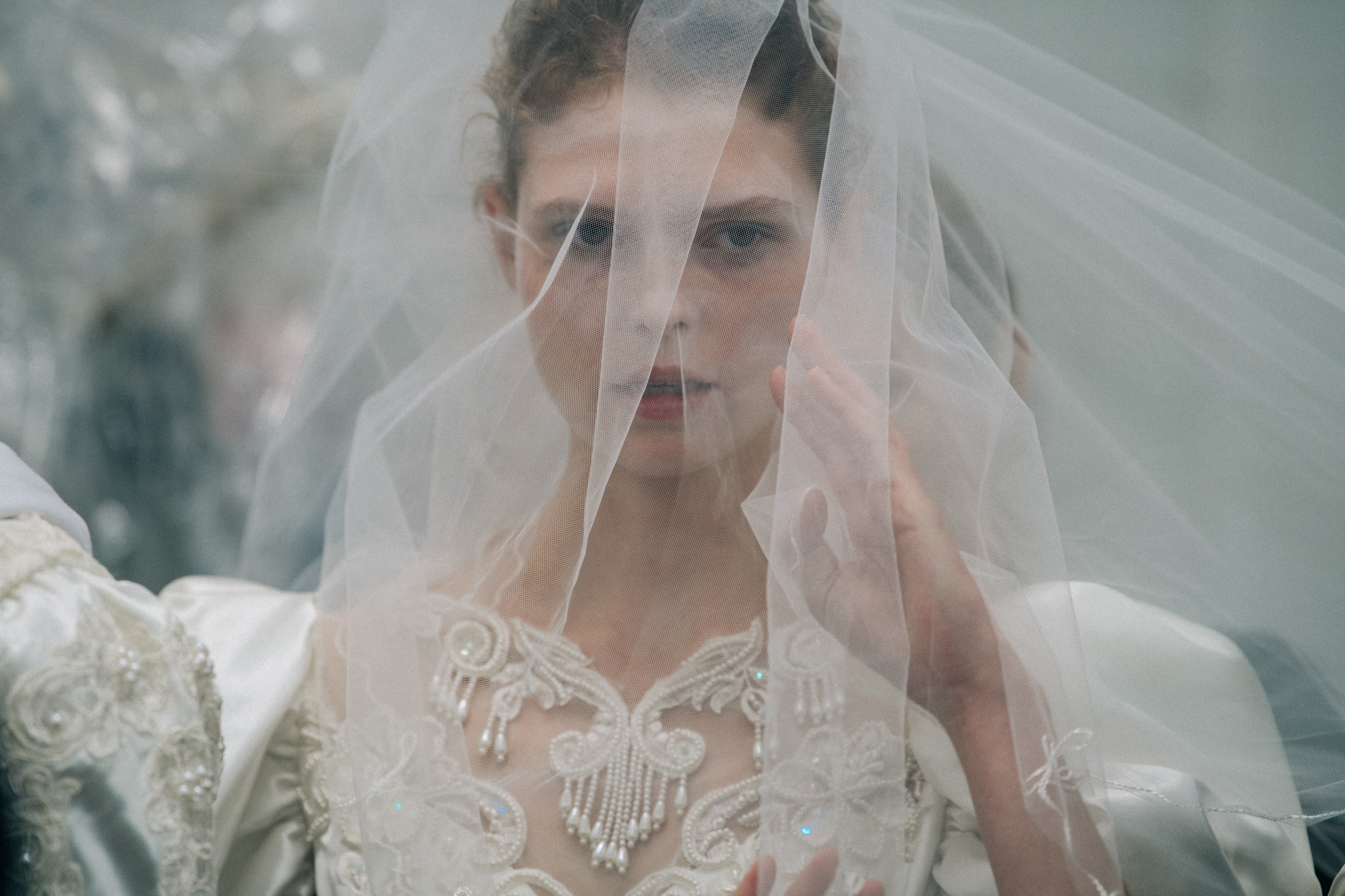 Model wearing white outfit at VF Vandevorst