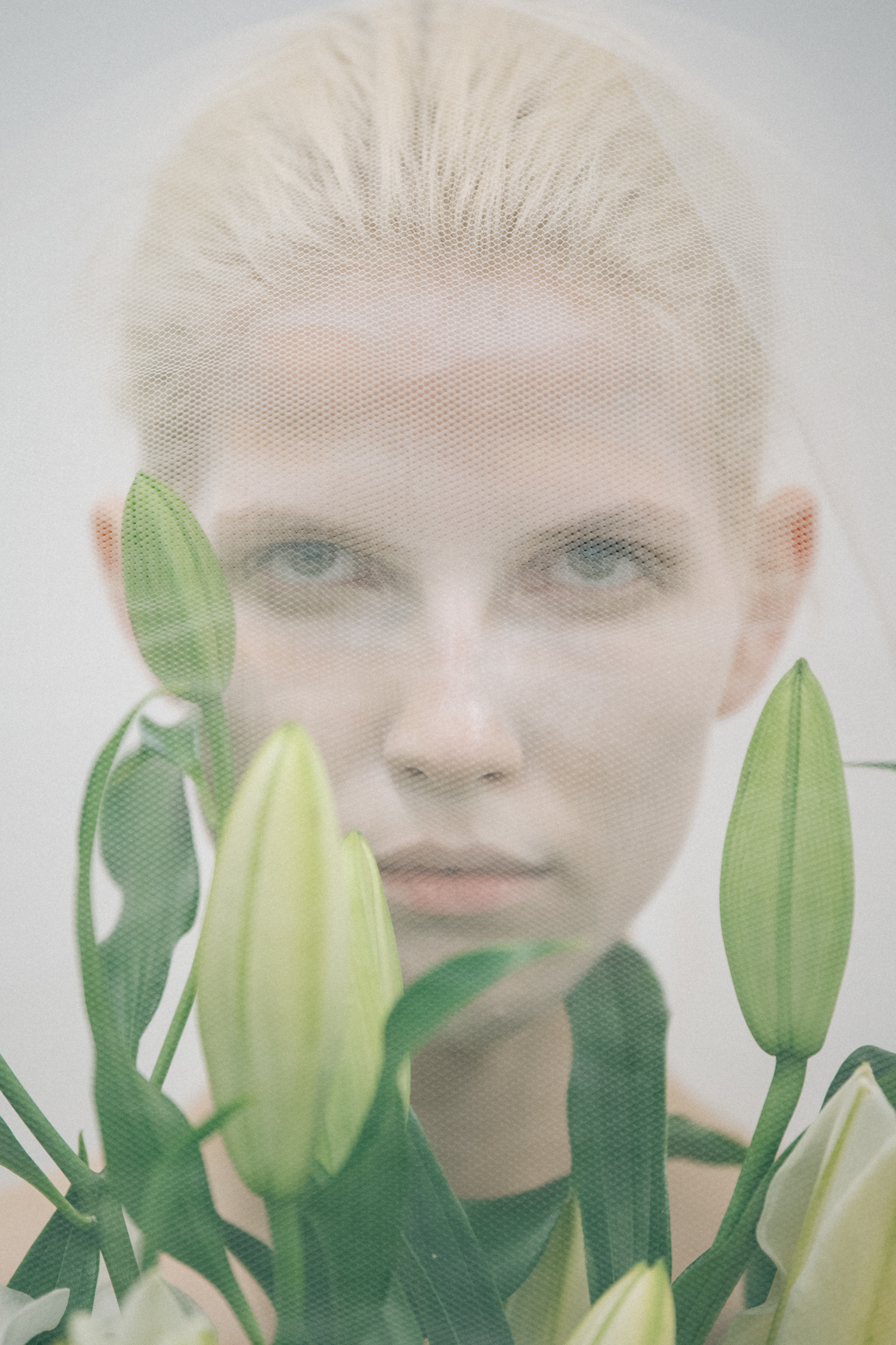Portrait of model carrying flowers