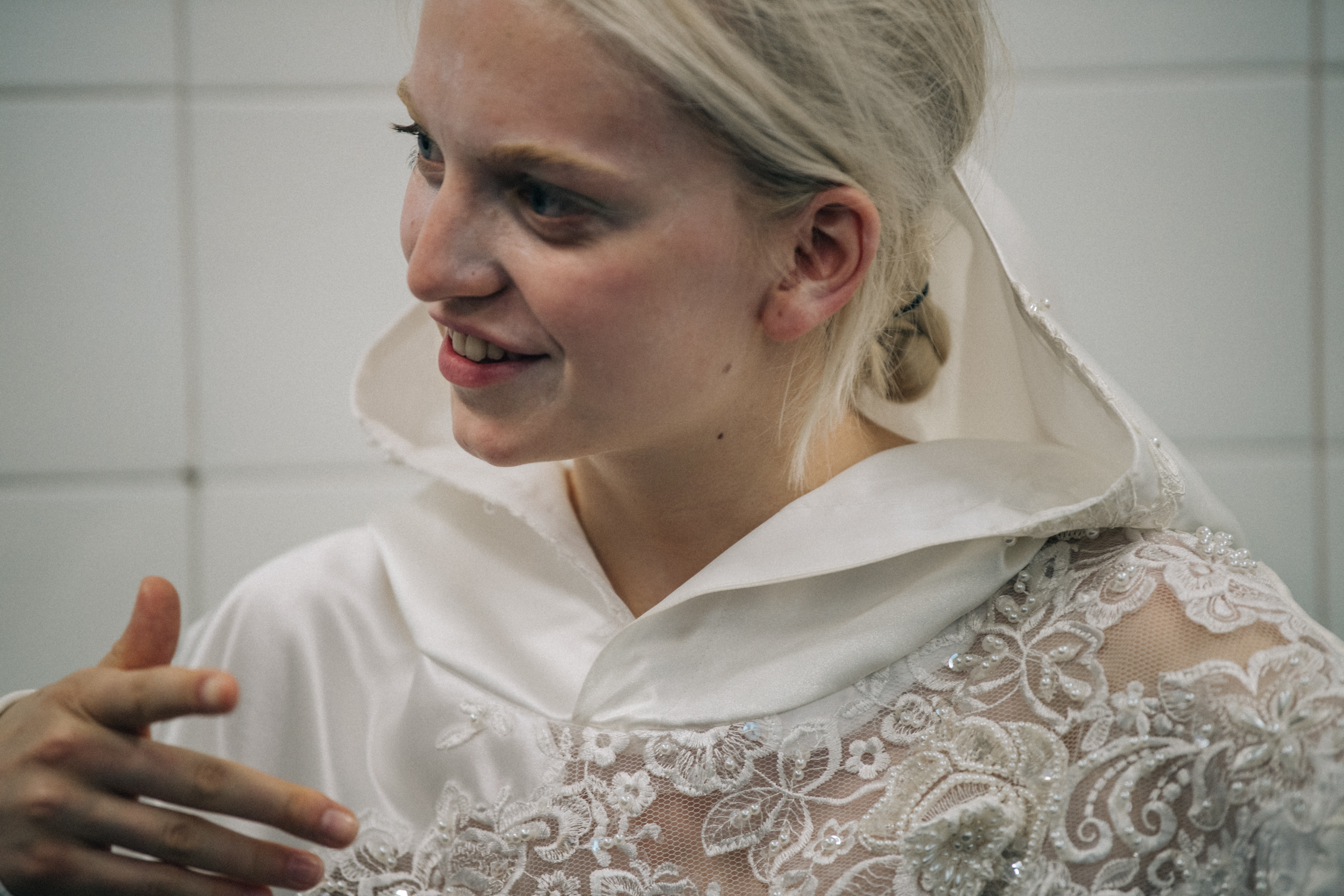 Model wearing white outfit at VF Vandevorst