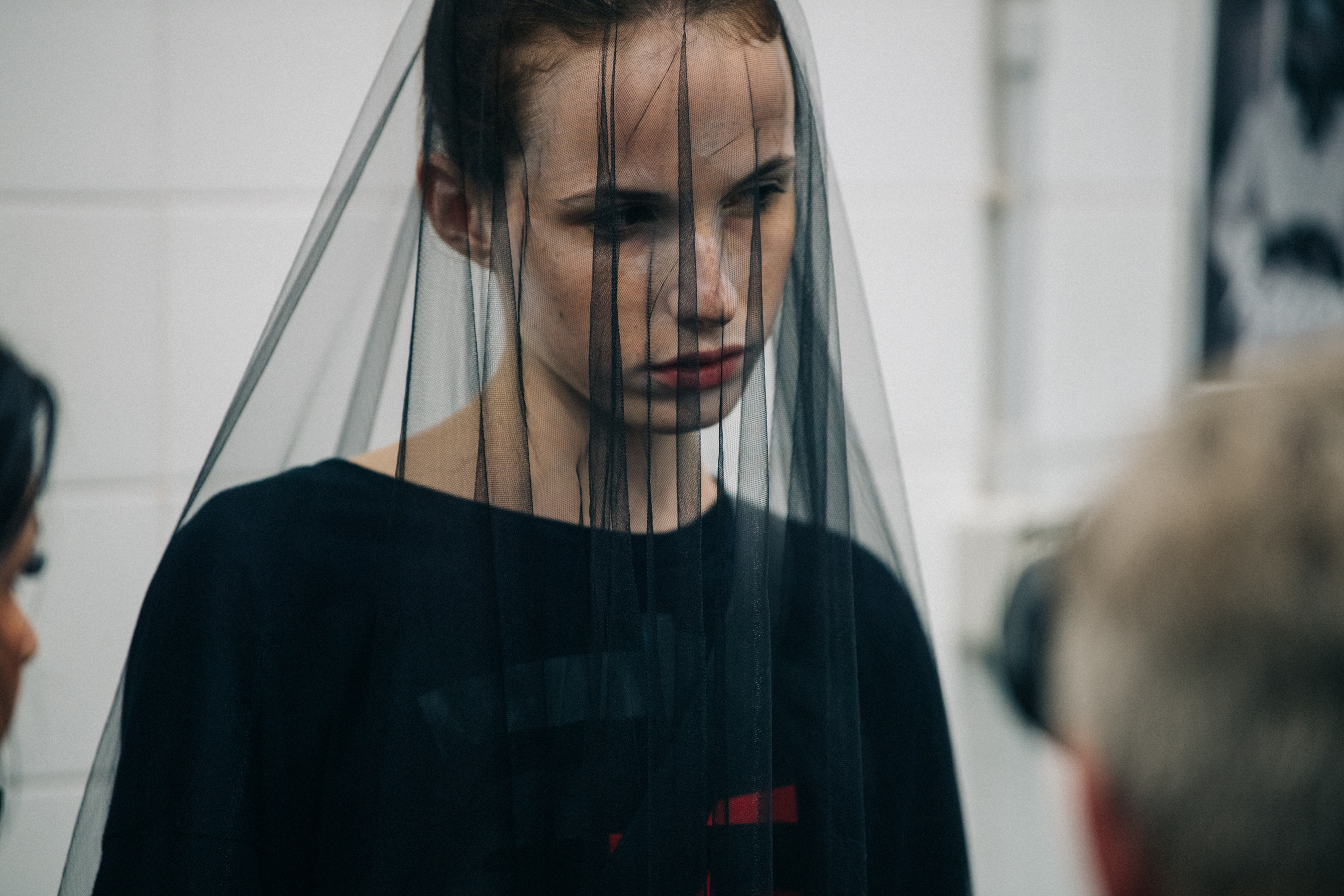 Model wearing black outfit at VF Vandevorst