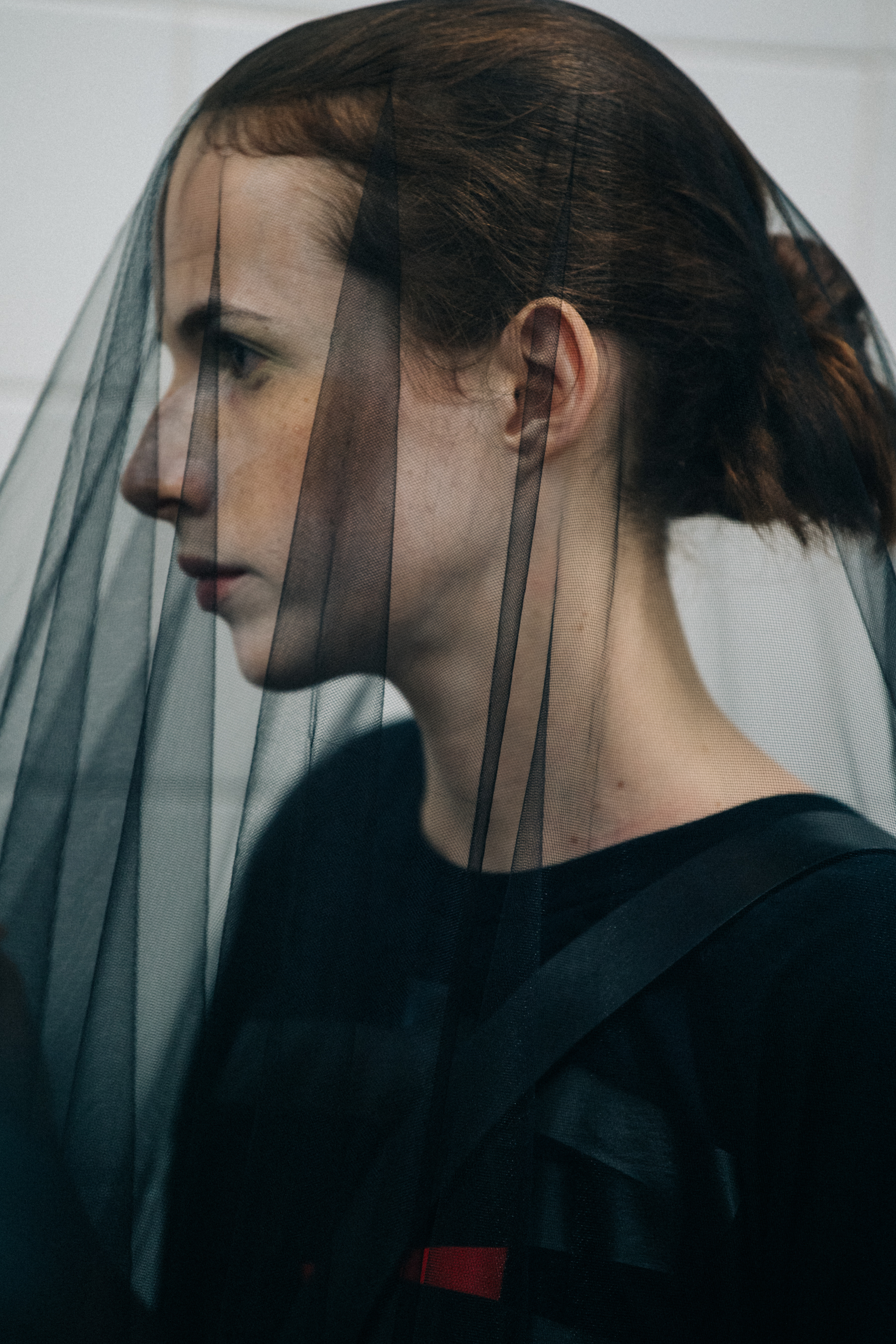 Model wearing black outfit at VF Vandevorst
