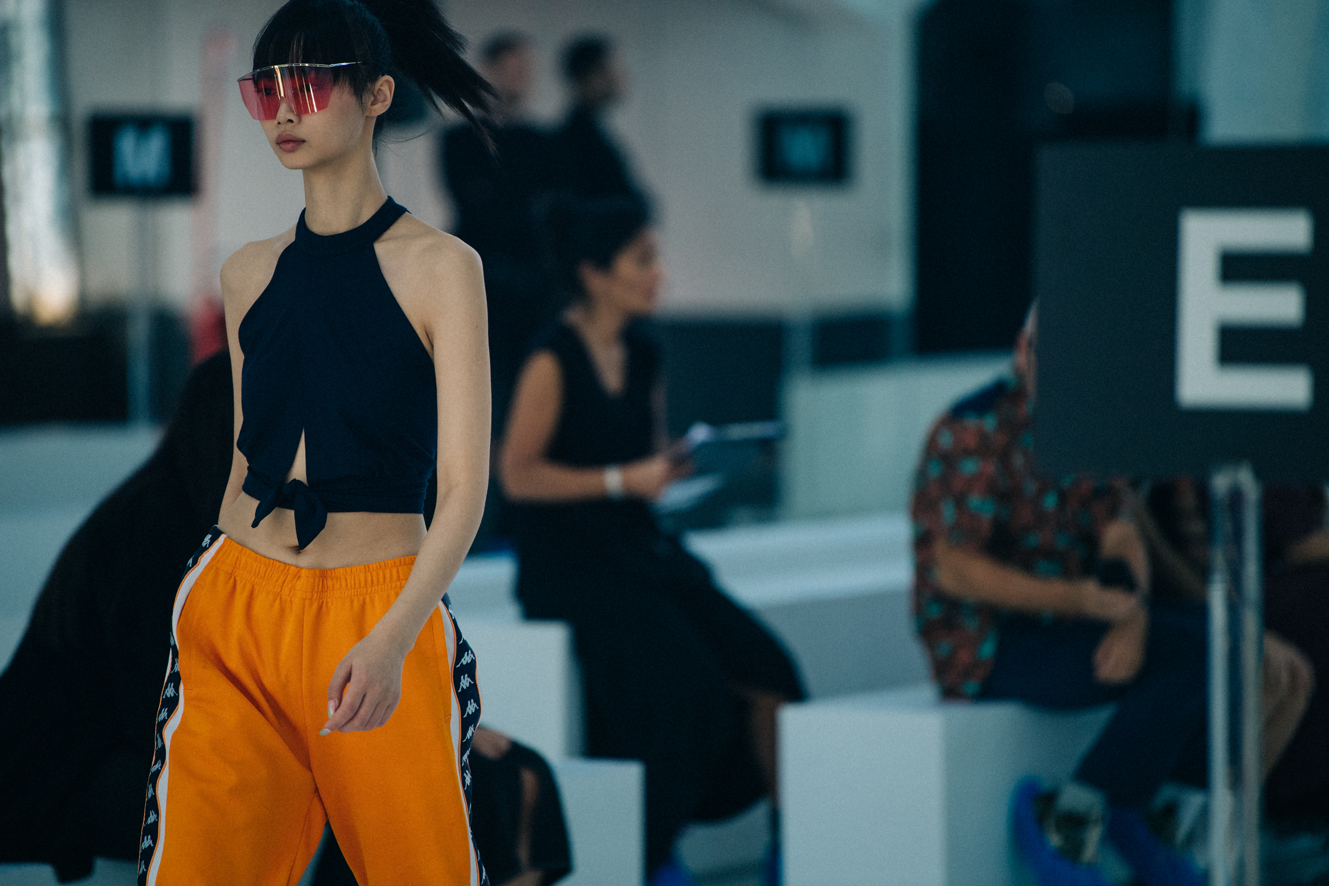 Model wearing large Byblos sunglasses