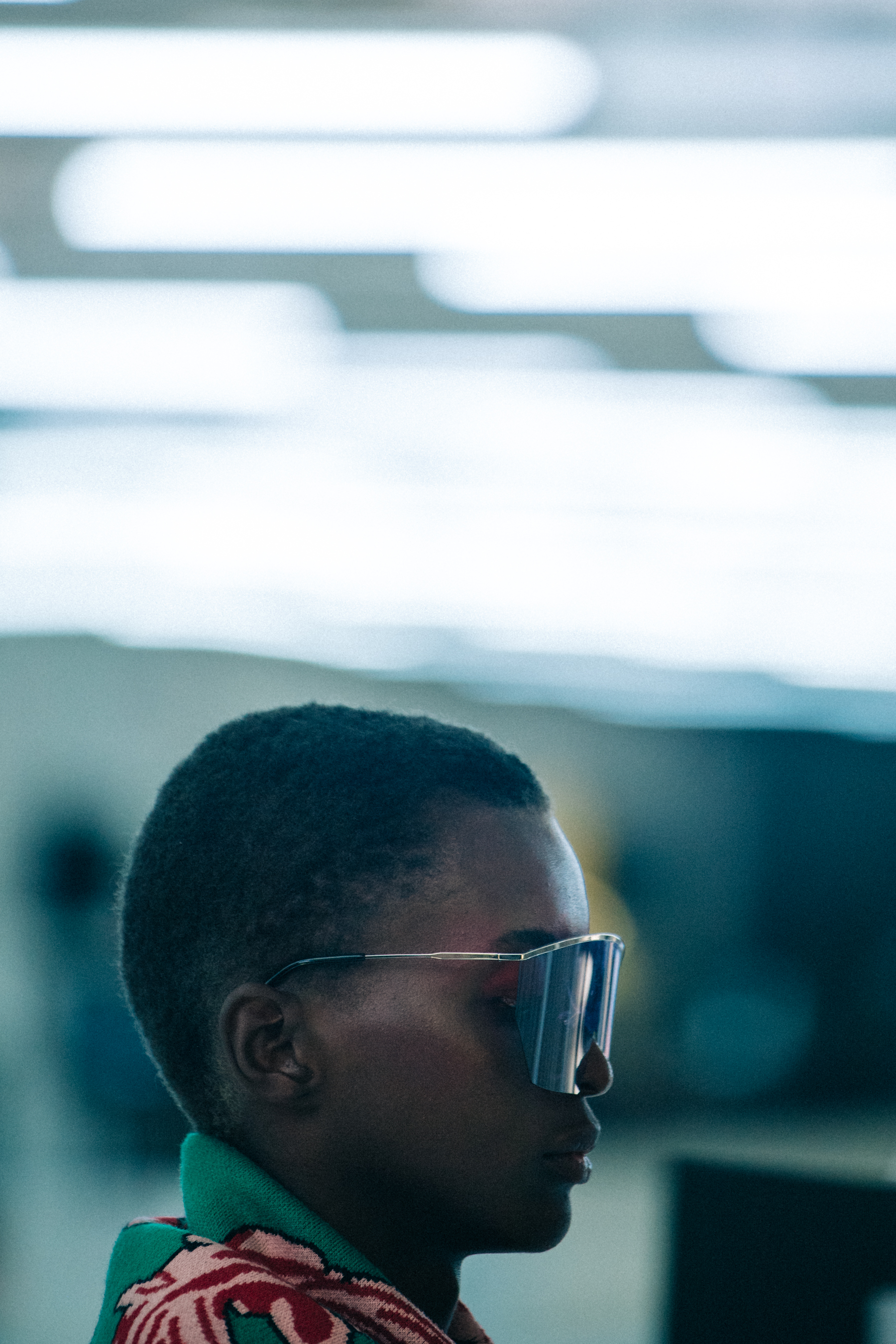 Model wearing large Byblos sunglasses