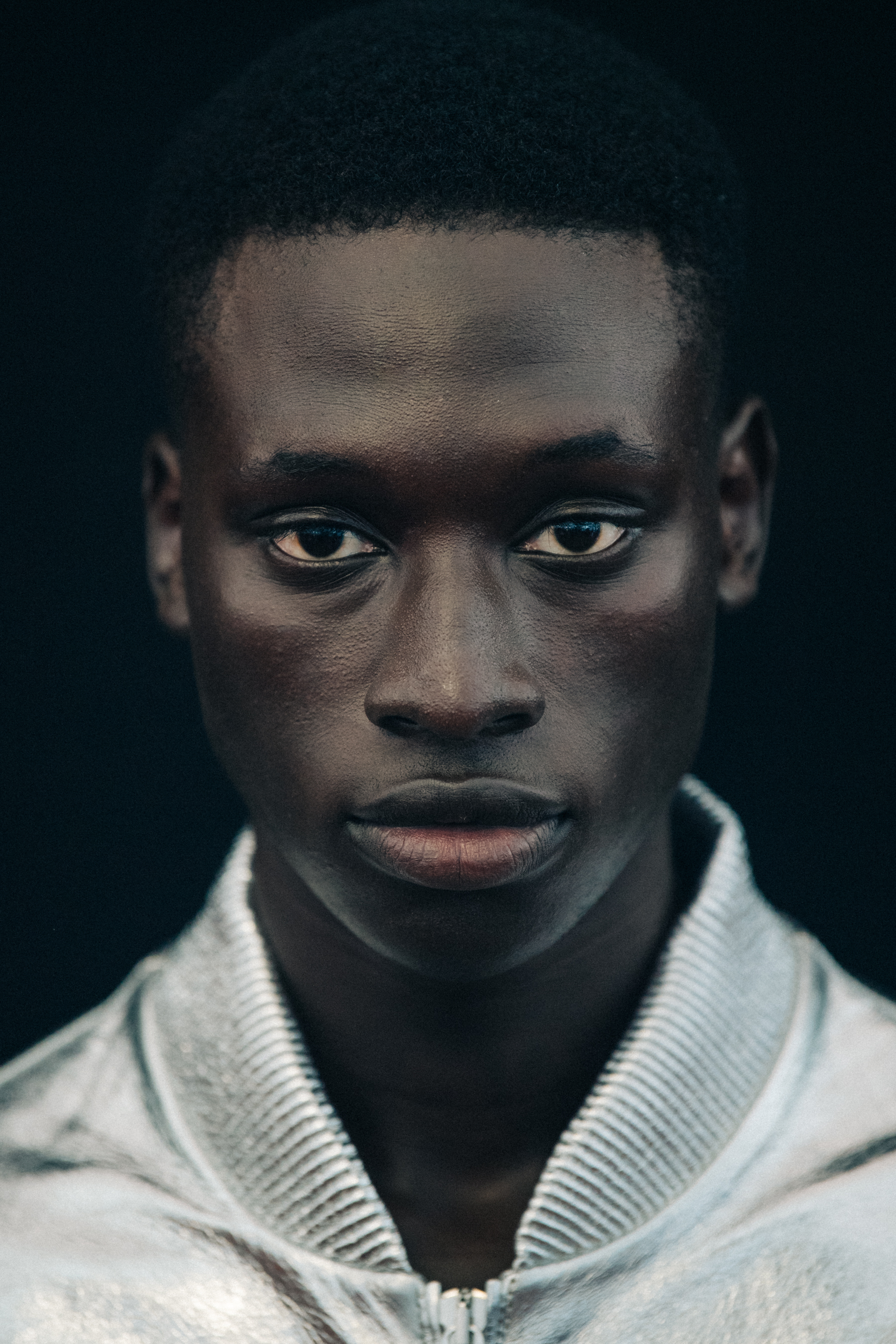 Portrait of model with short dark hair
