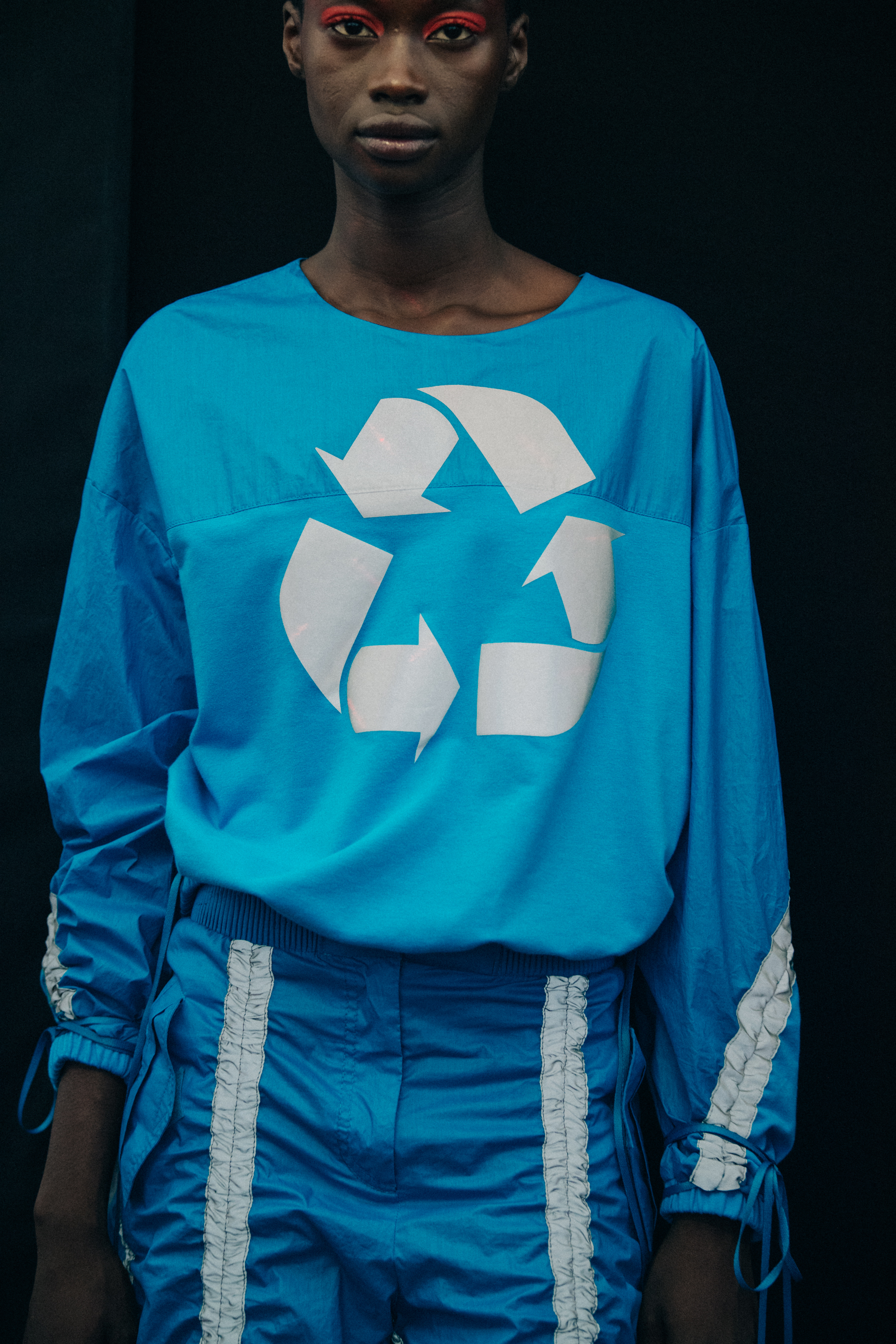 Models wearing blue Byblos outfits