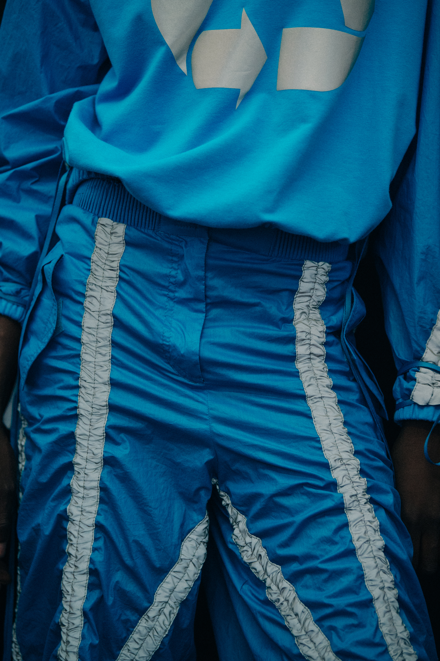 Models wearing blue Byblos outfits
