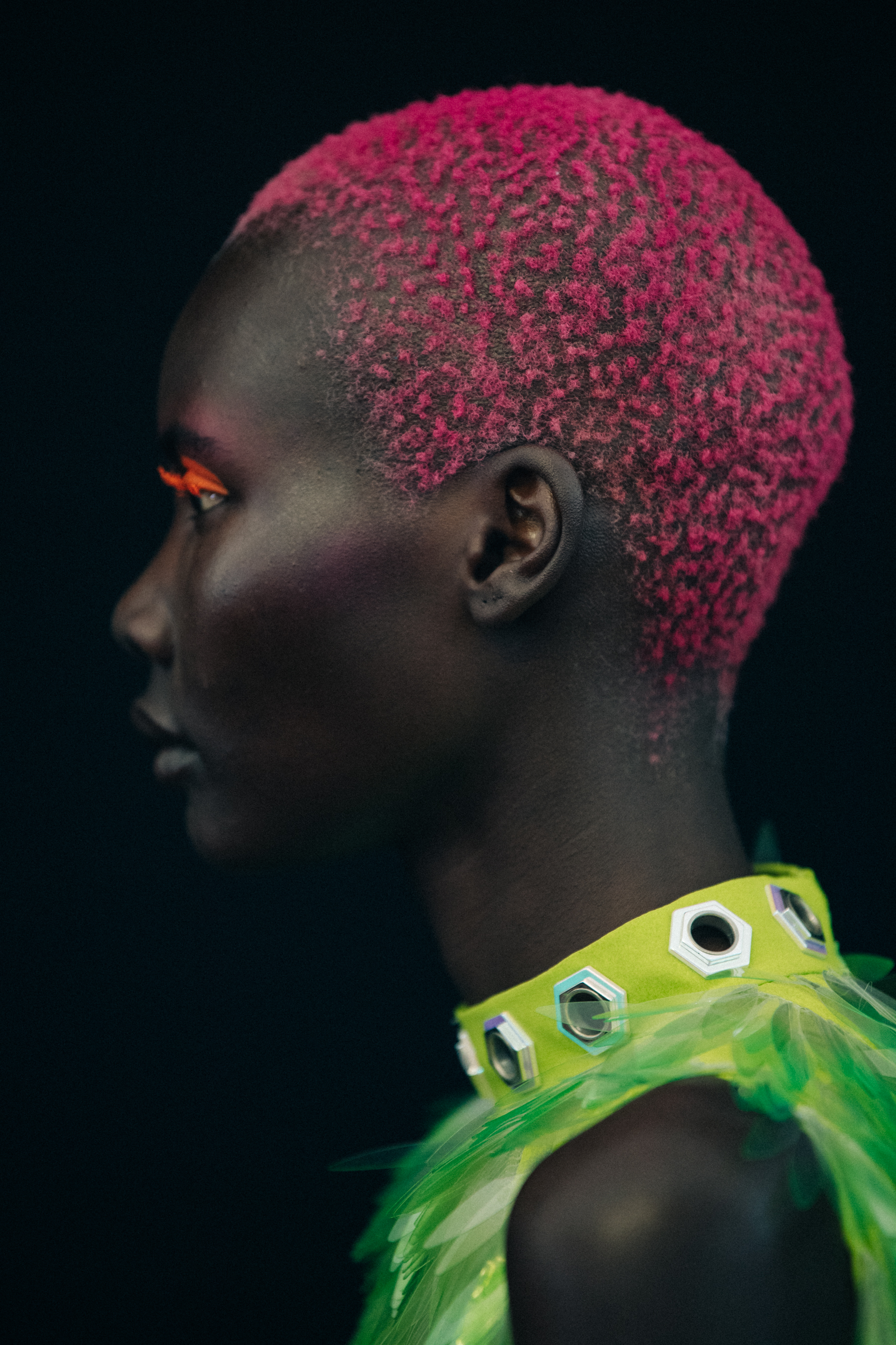 Models wearing colourful eyeliner