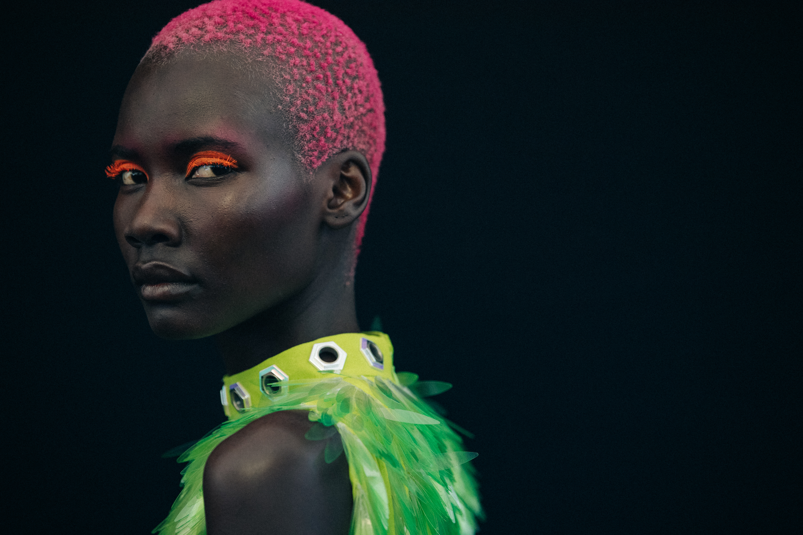 Models wearing colourful eyeliner