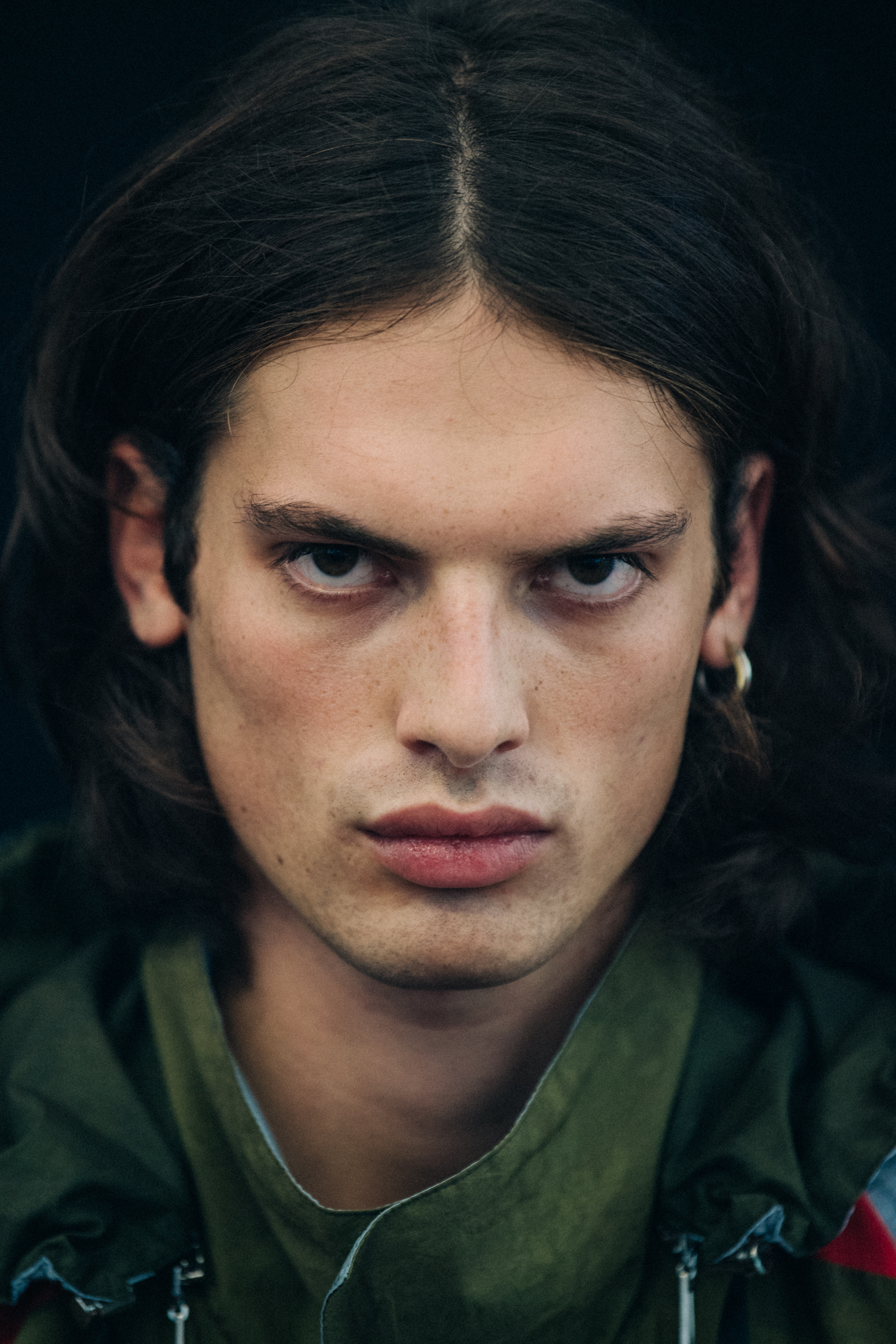 Portrait of model with long dark hair