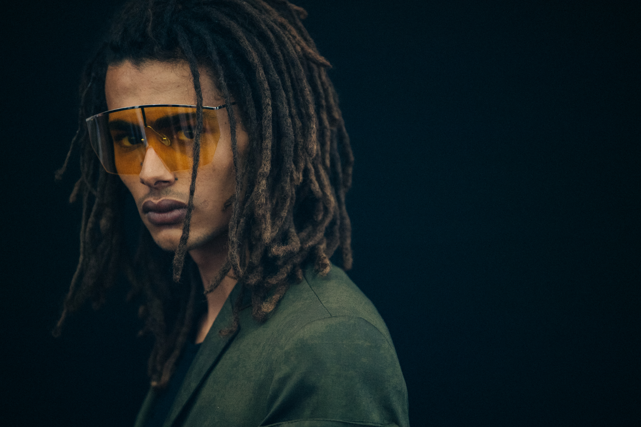 Model wearing large Byblos sunglasses