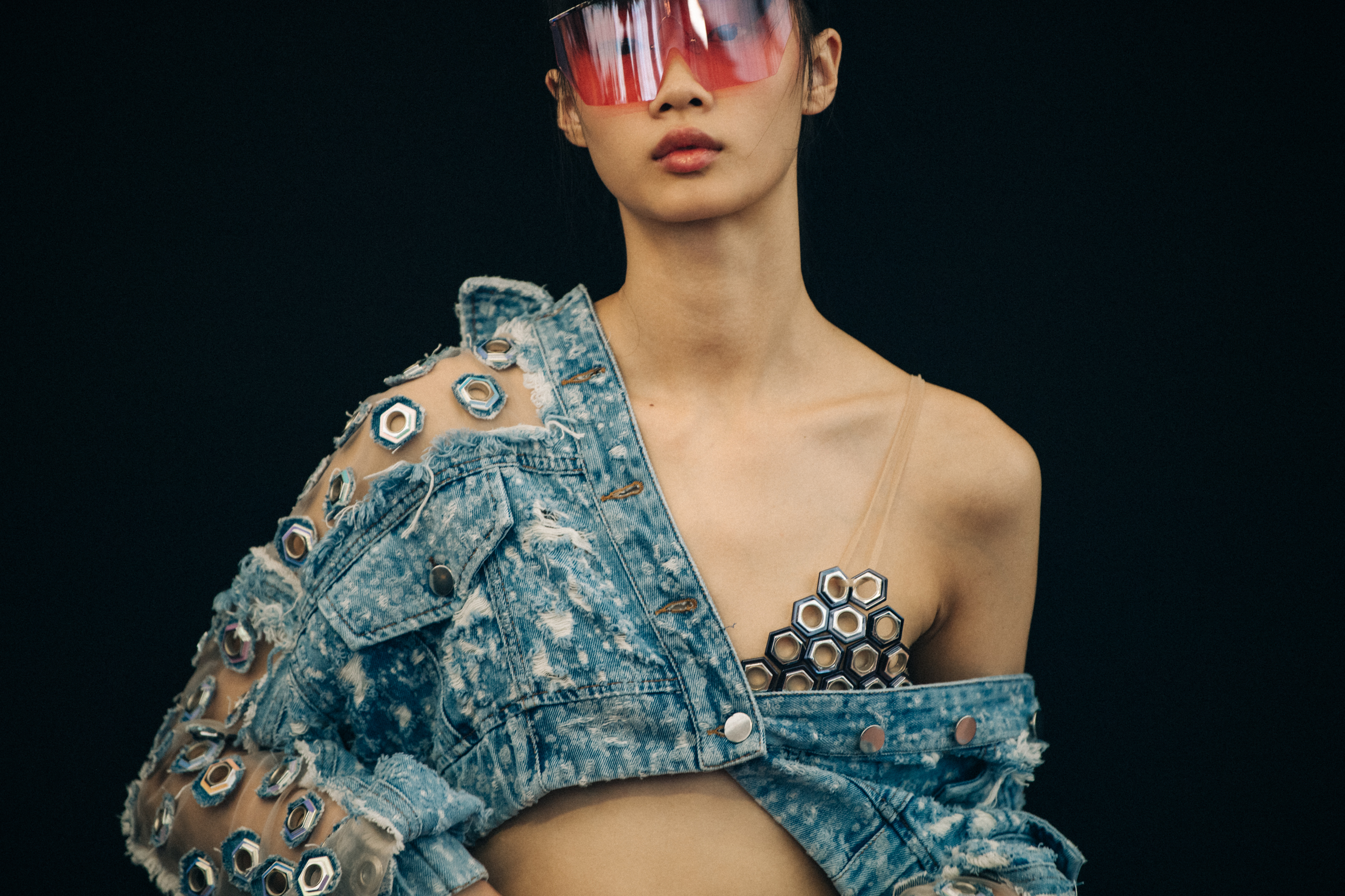Model wearing large Byblos sunglasses