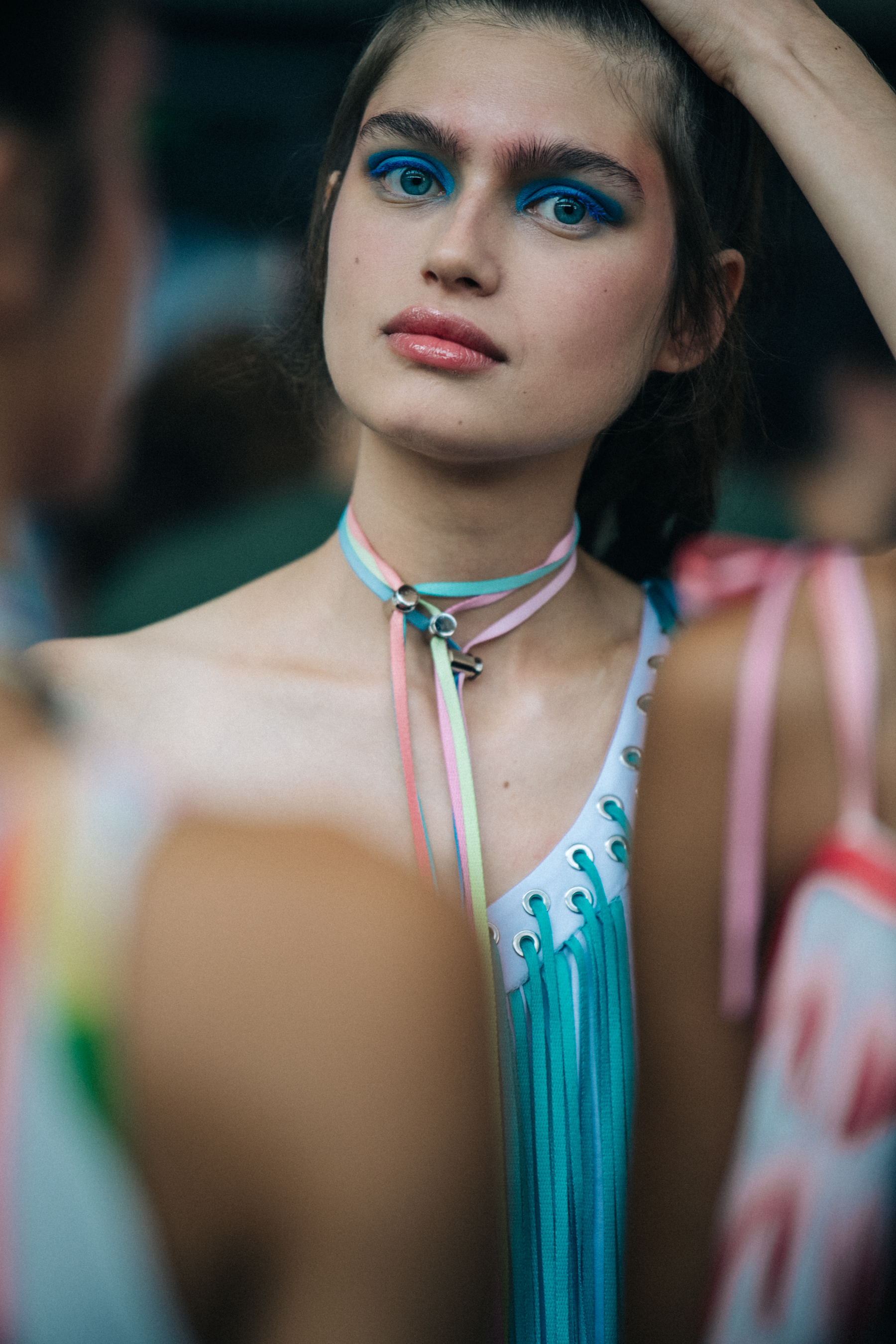 Models wearing colourful eyeliner