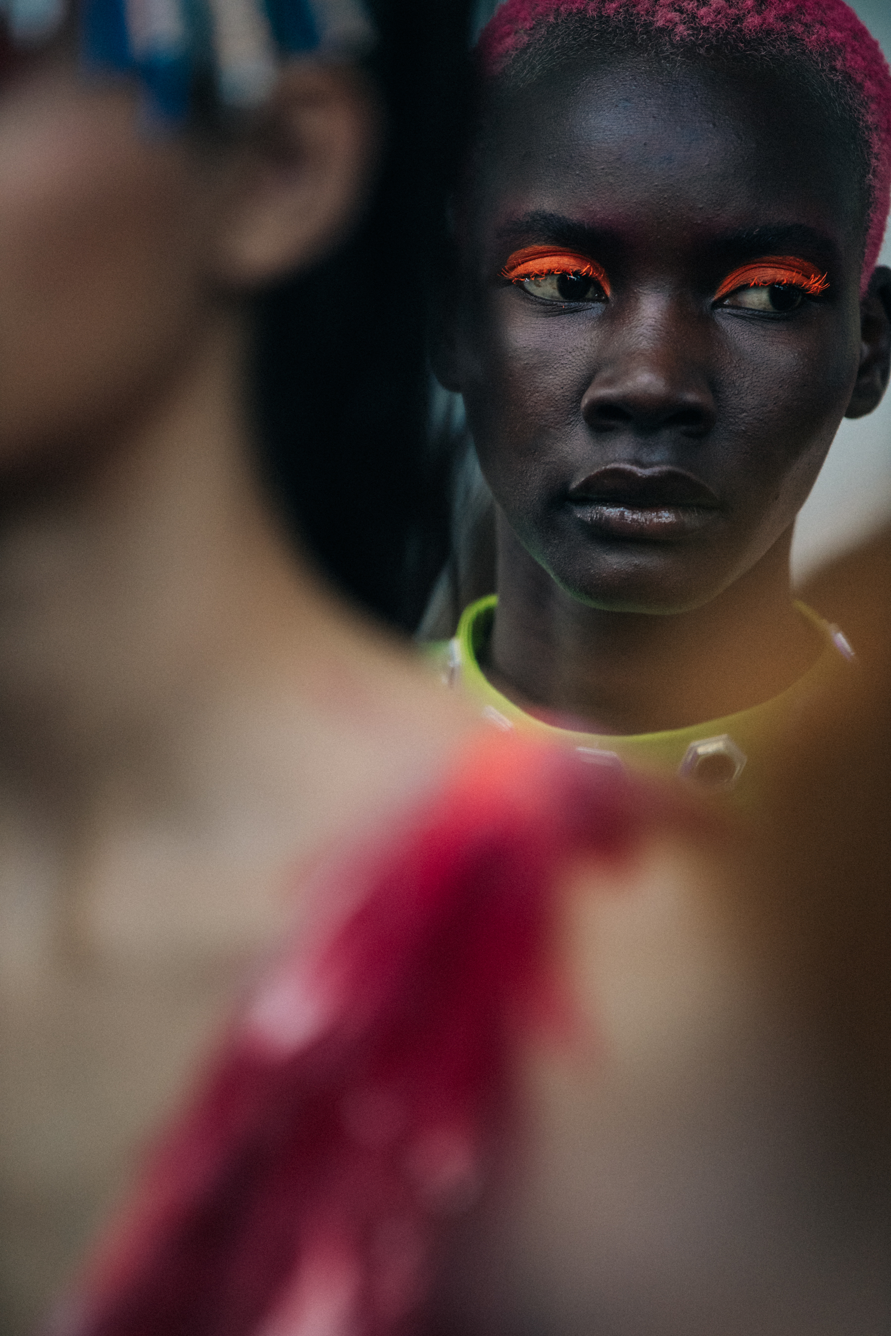 Models wearing colourful eyeliner