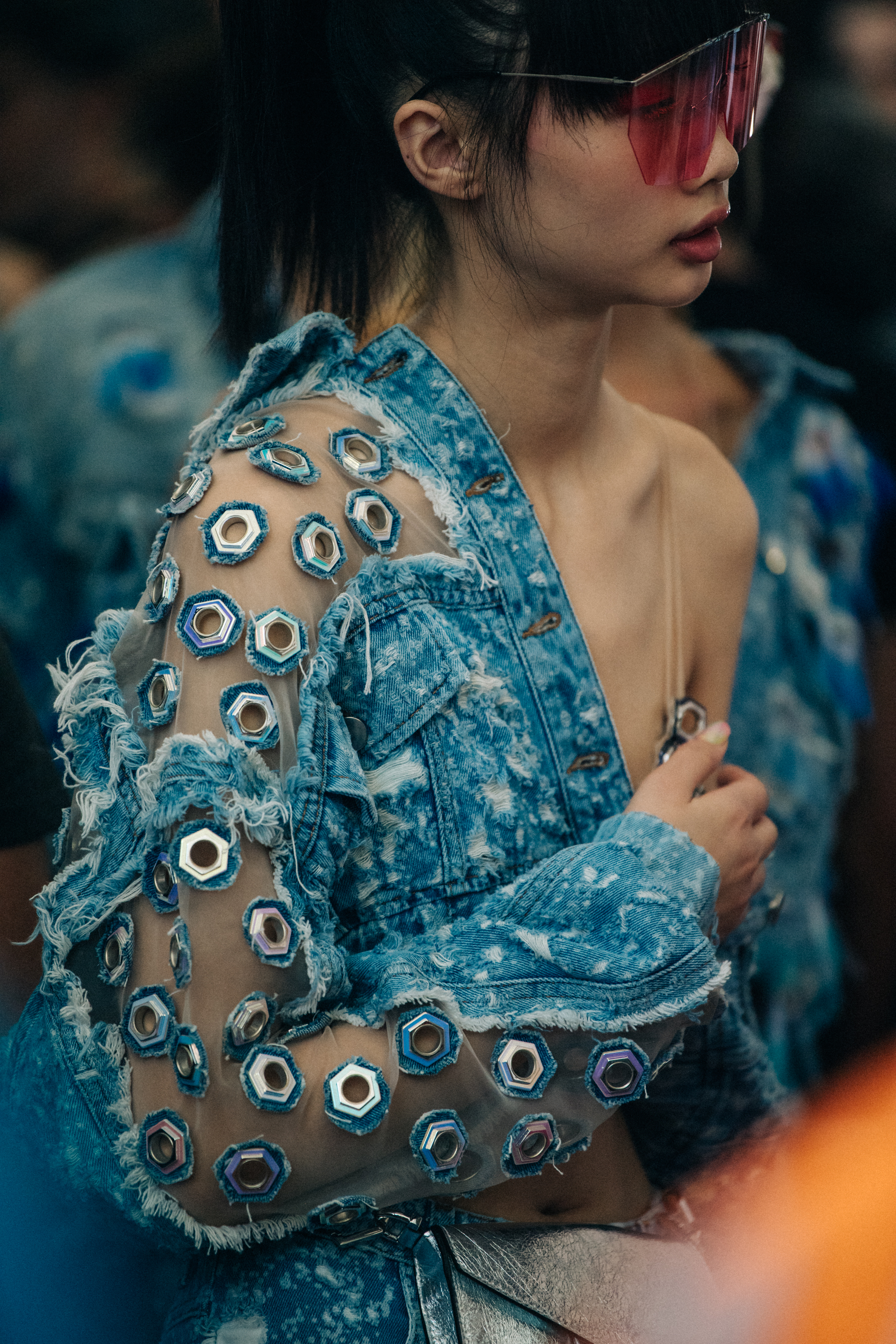 Model wearing large Byblos sunglasses