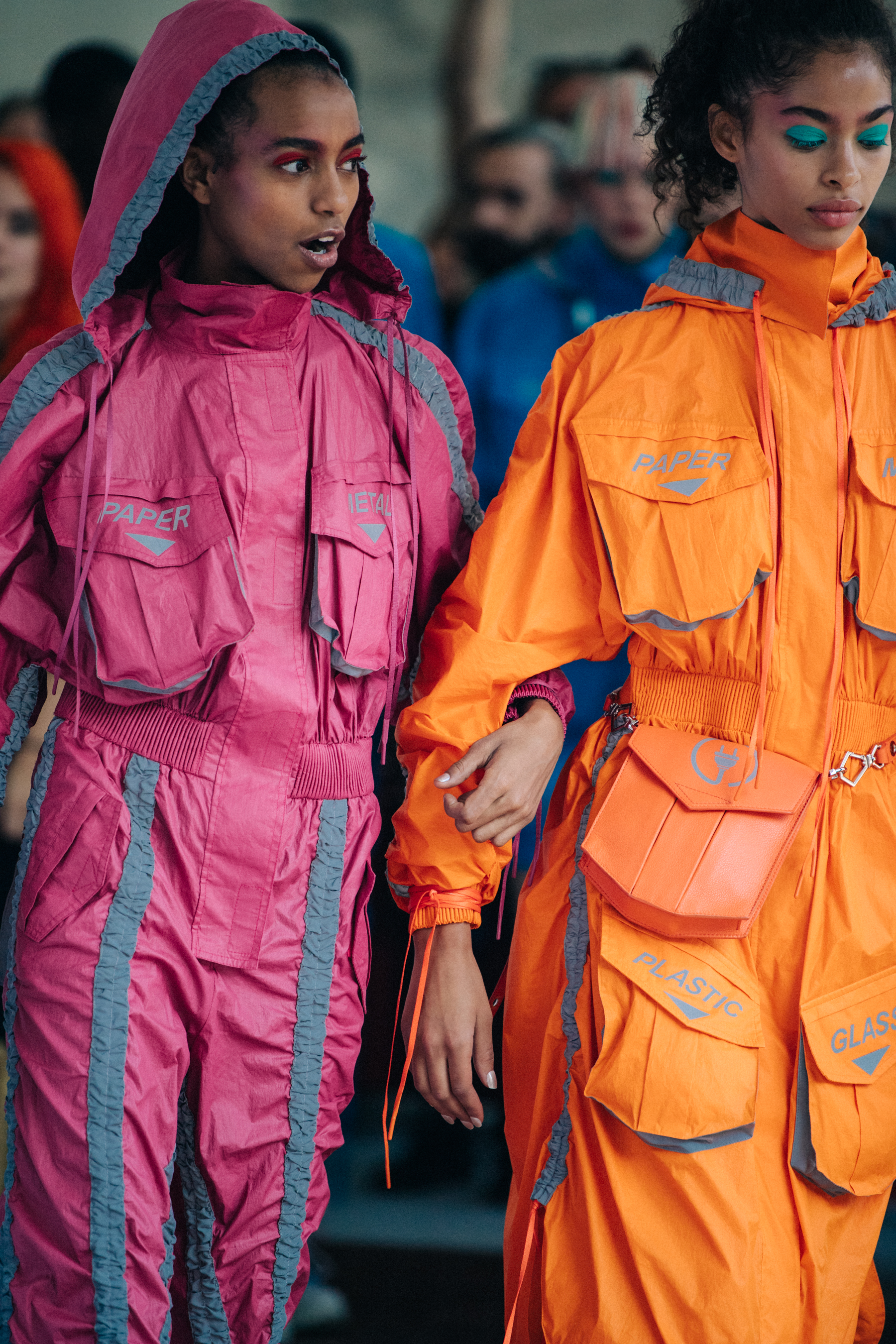 Models wearing colourful Byblos jumpsuits