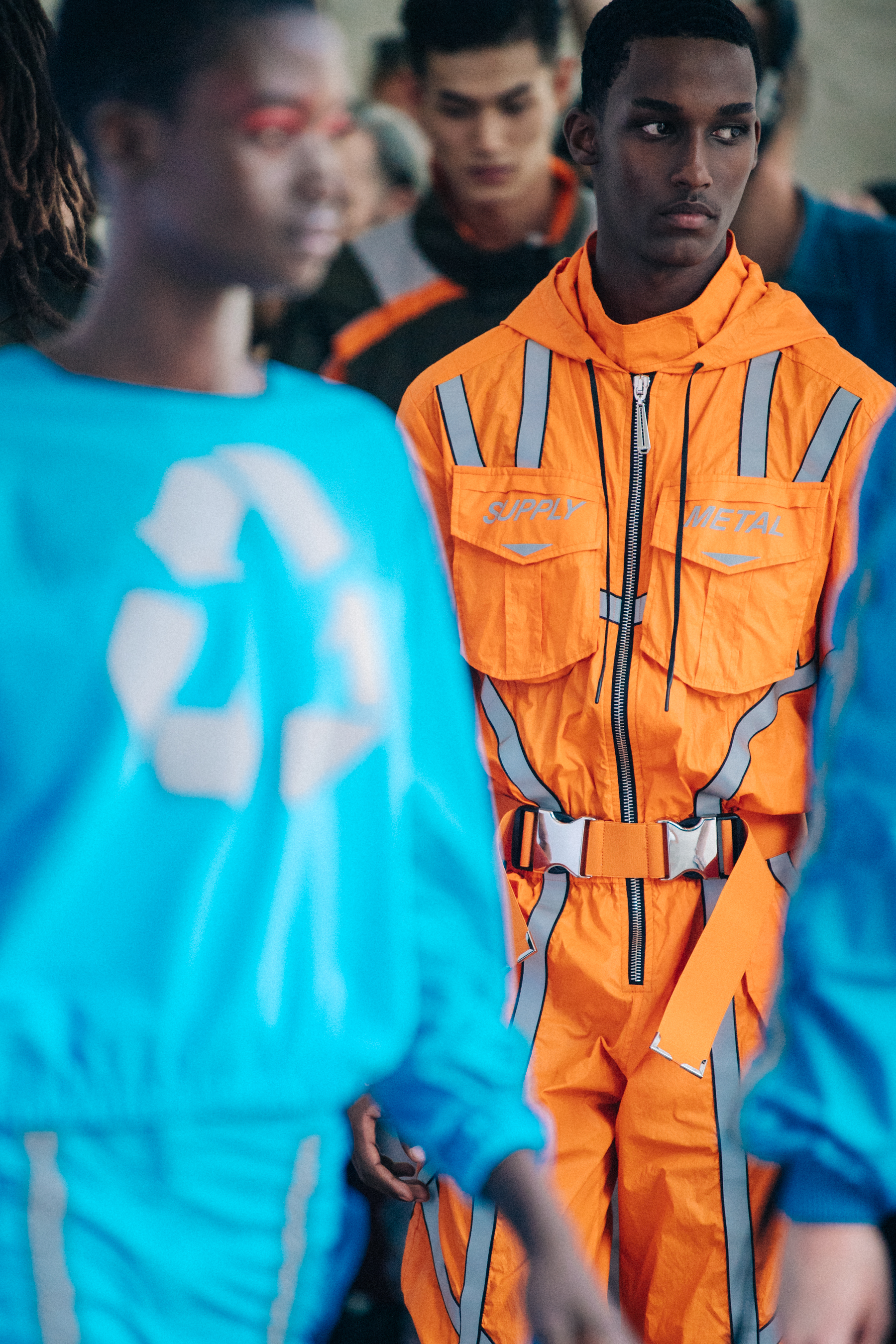 Models wearing colourful Byblos jumpsuits
