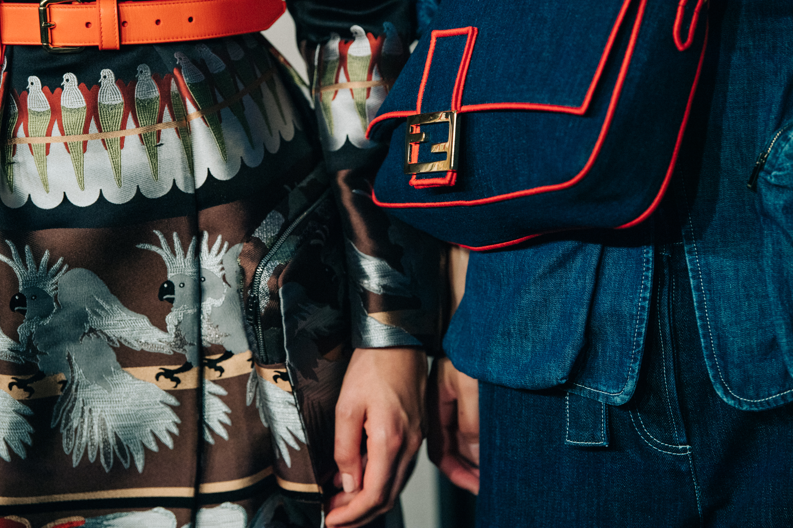 Model carrying denim Fendi bag
