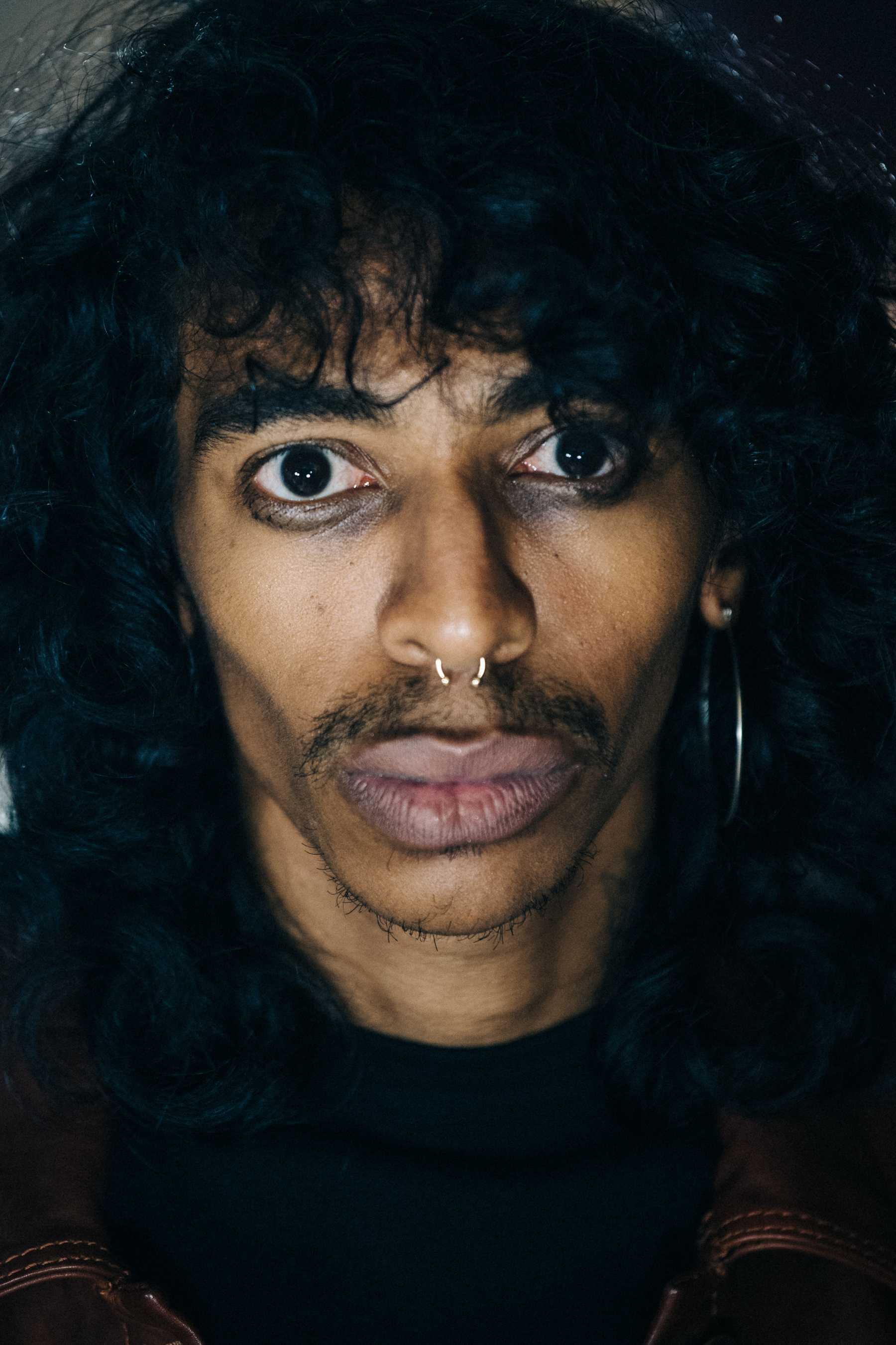 Portrait of model with long black hair