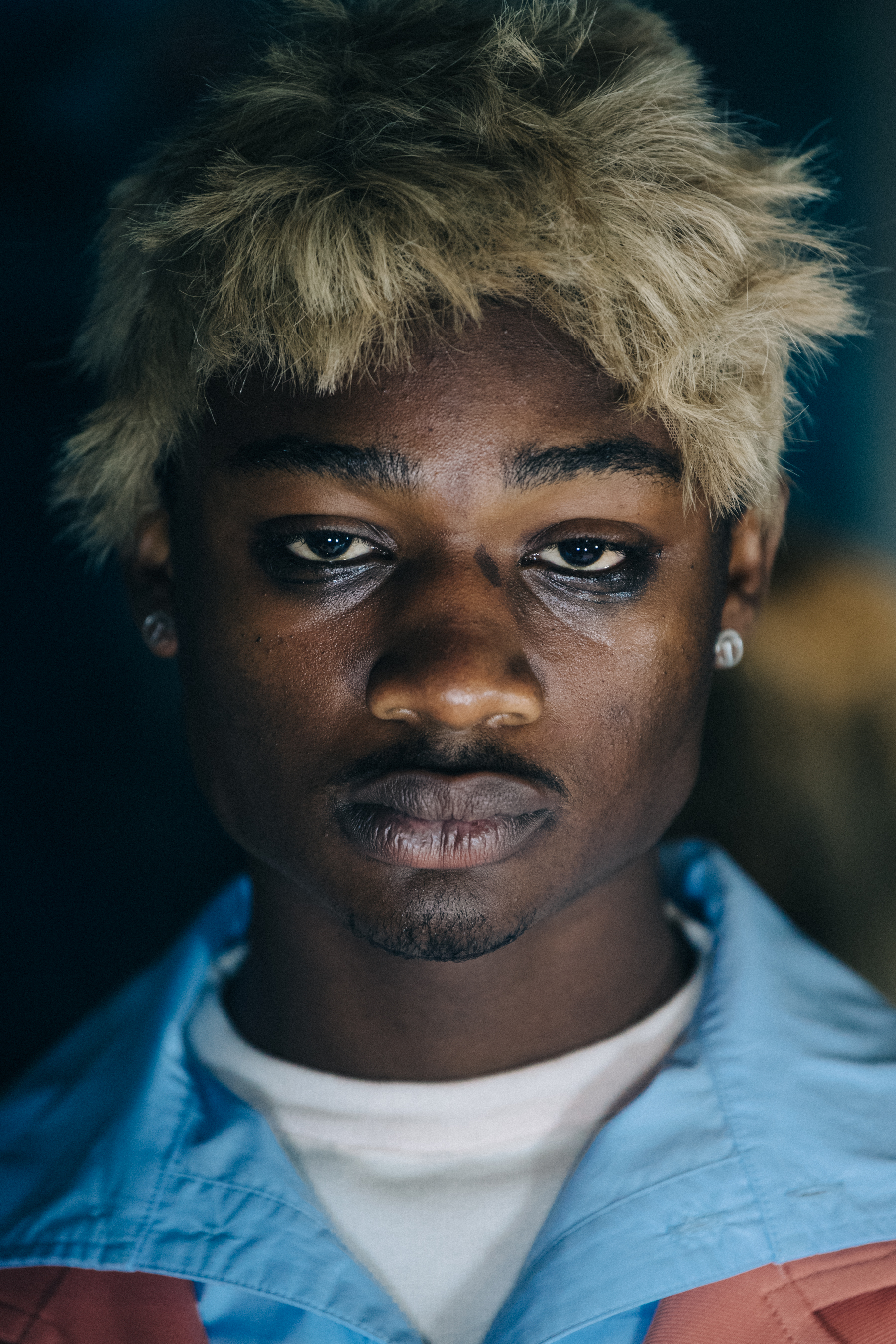 Portrait of black model with blonde hair