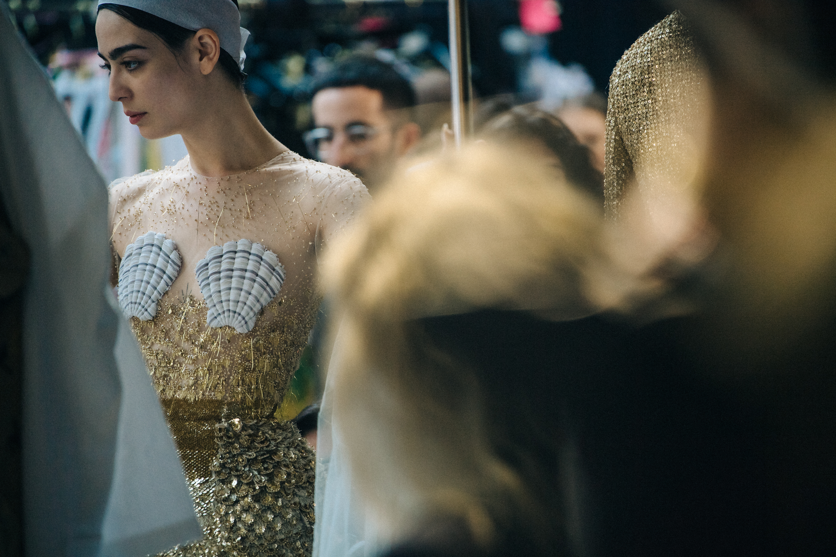 Model wearing lace Thom Browne outfit