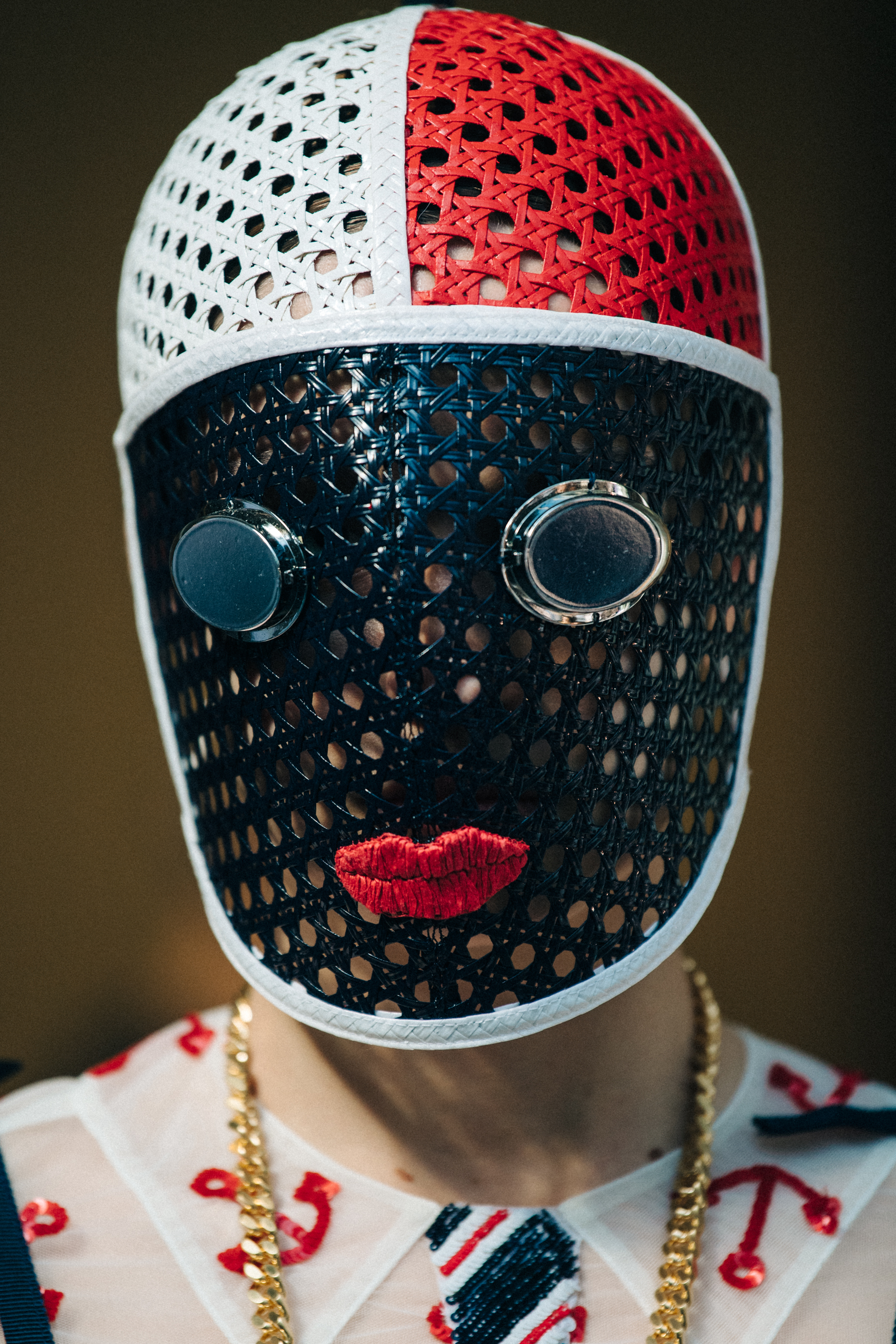 Portrait of model wearing Thom Browne mask