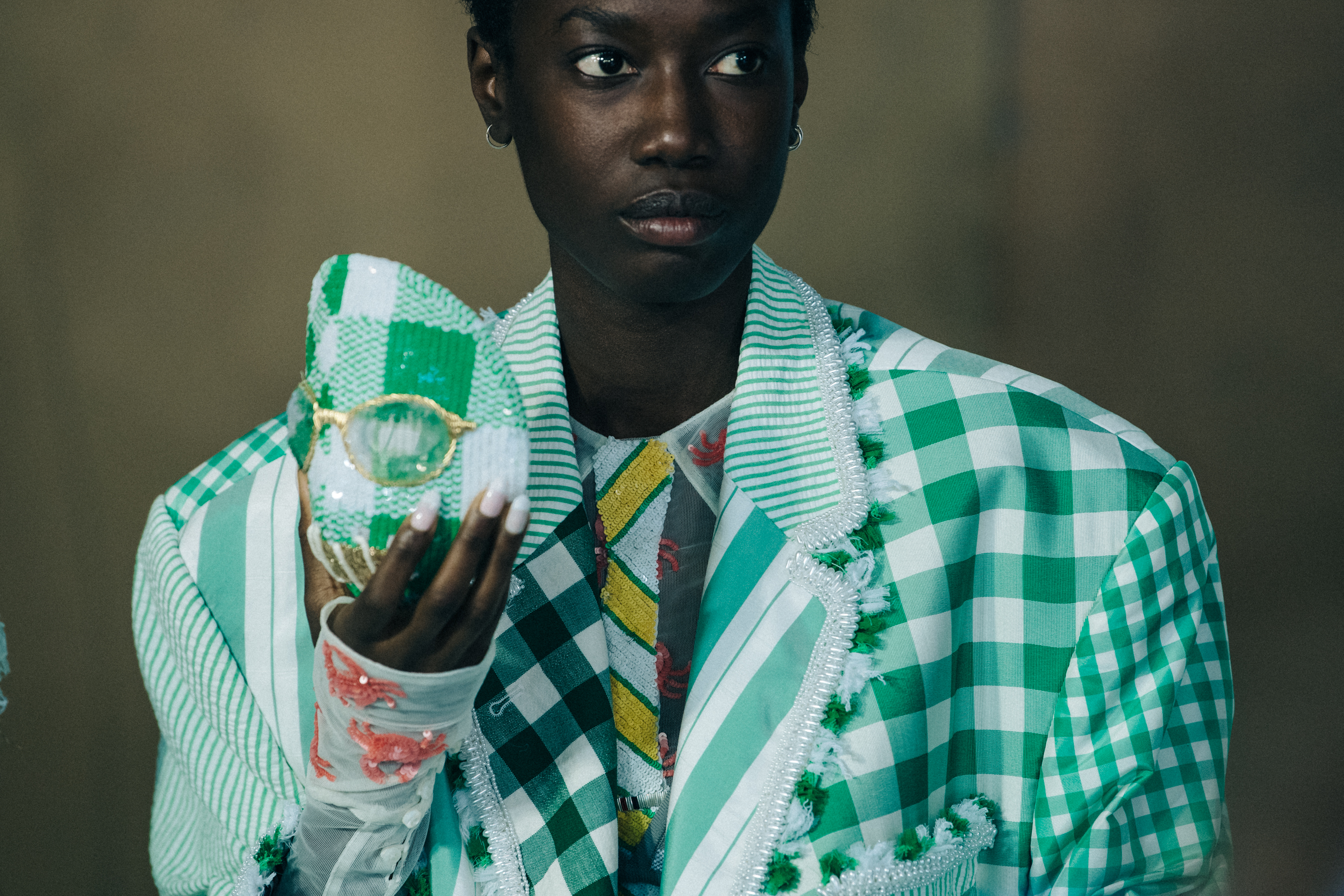 Models wearing colourful Thom Browne suits