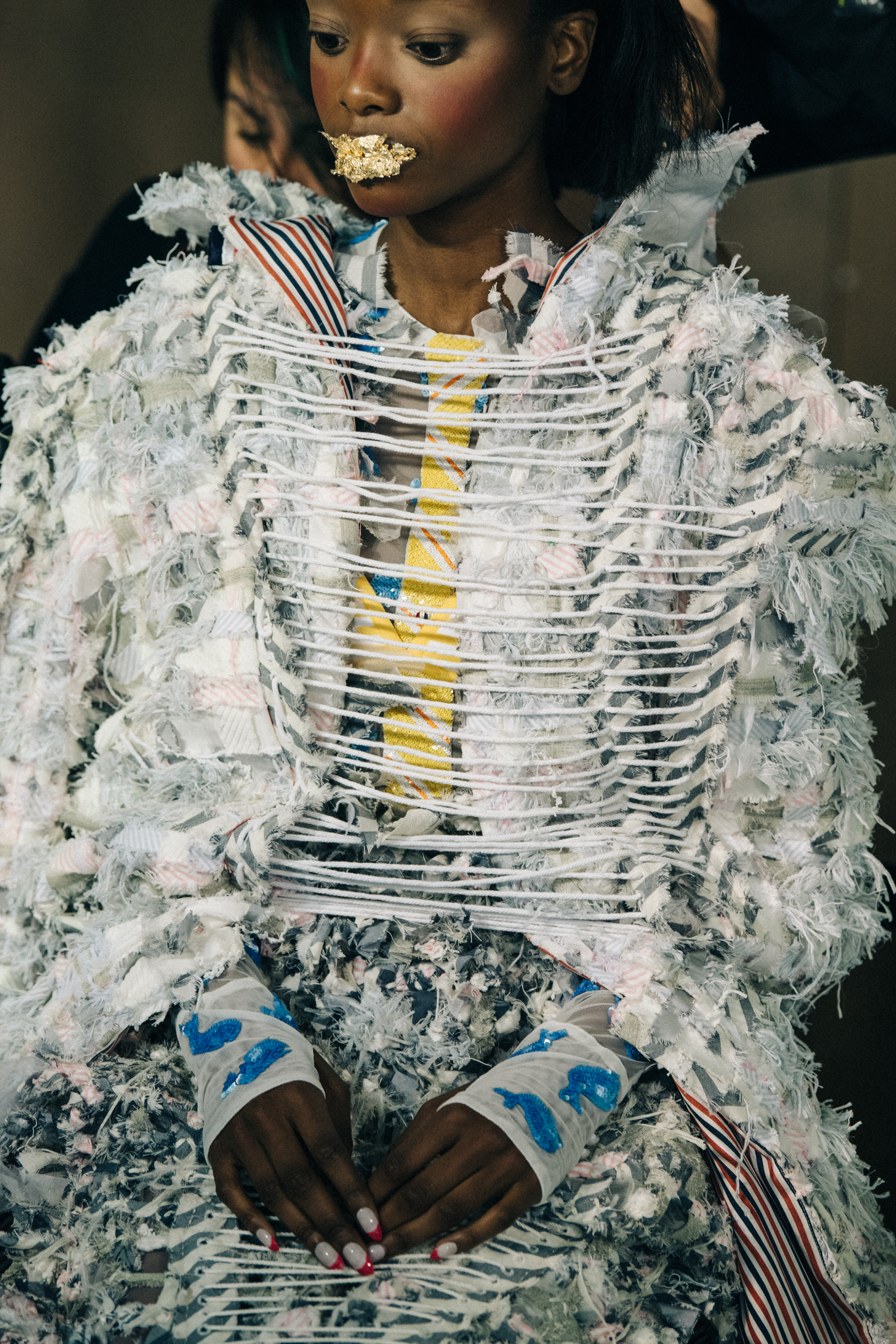 Models wearing colourful Thom Browne suits