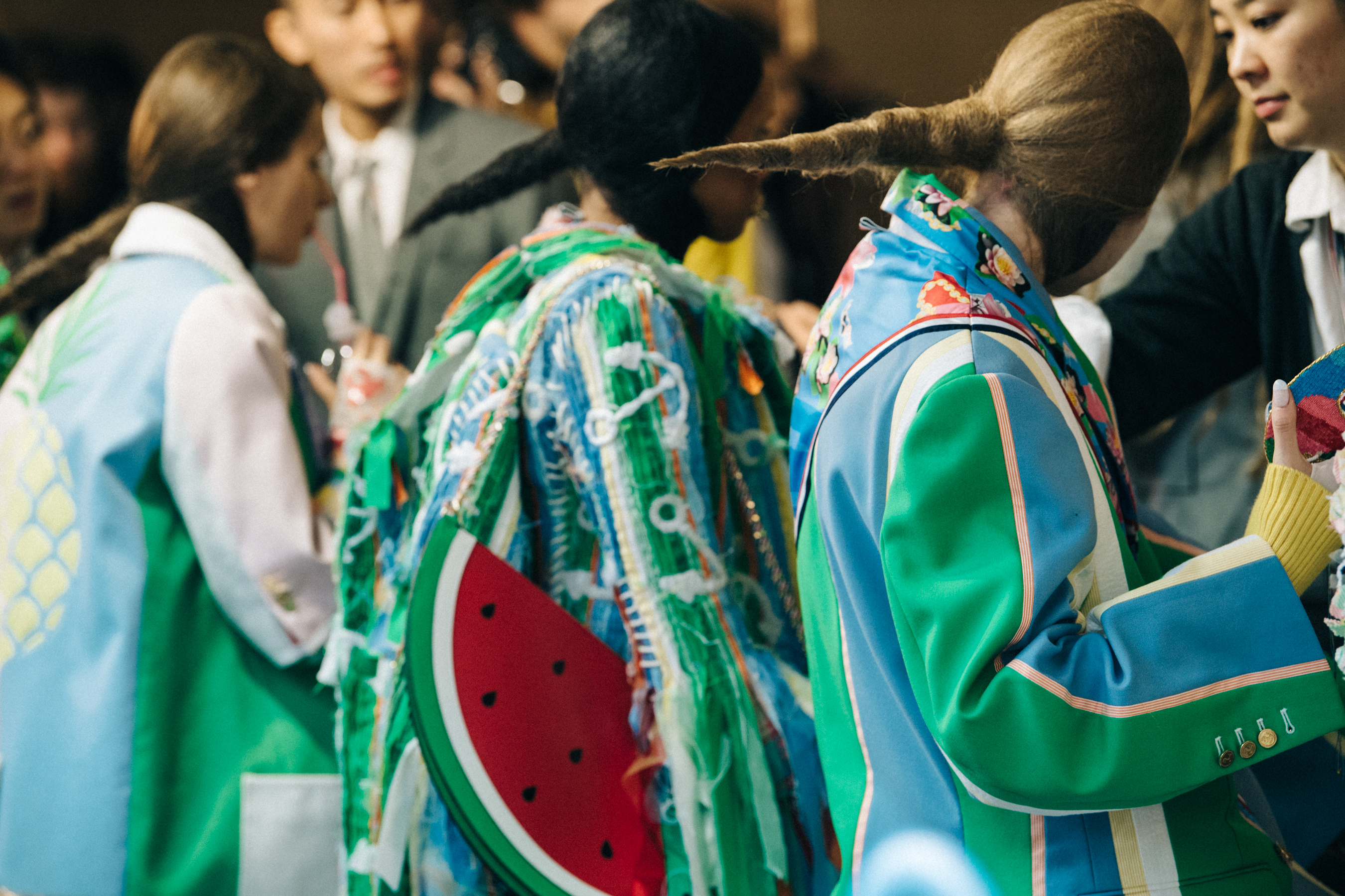 Models wearing colourful Thom Browne suits