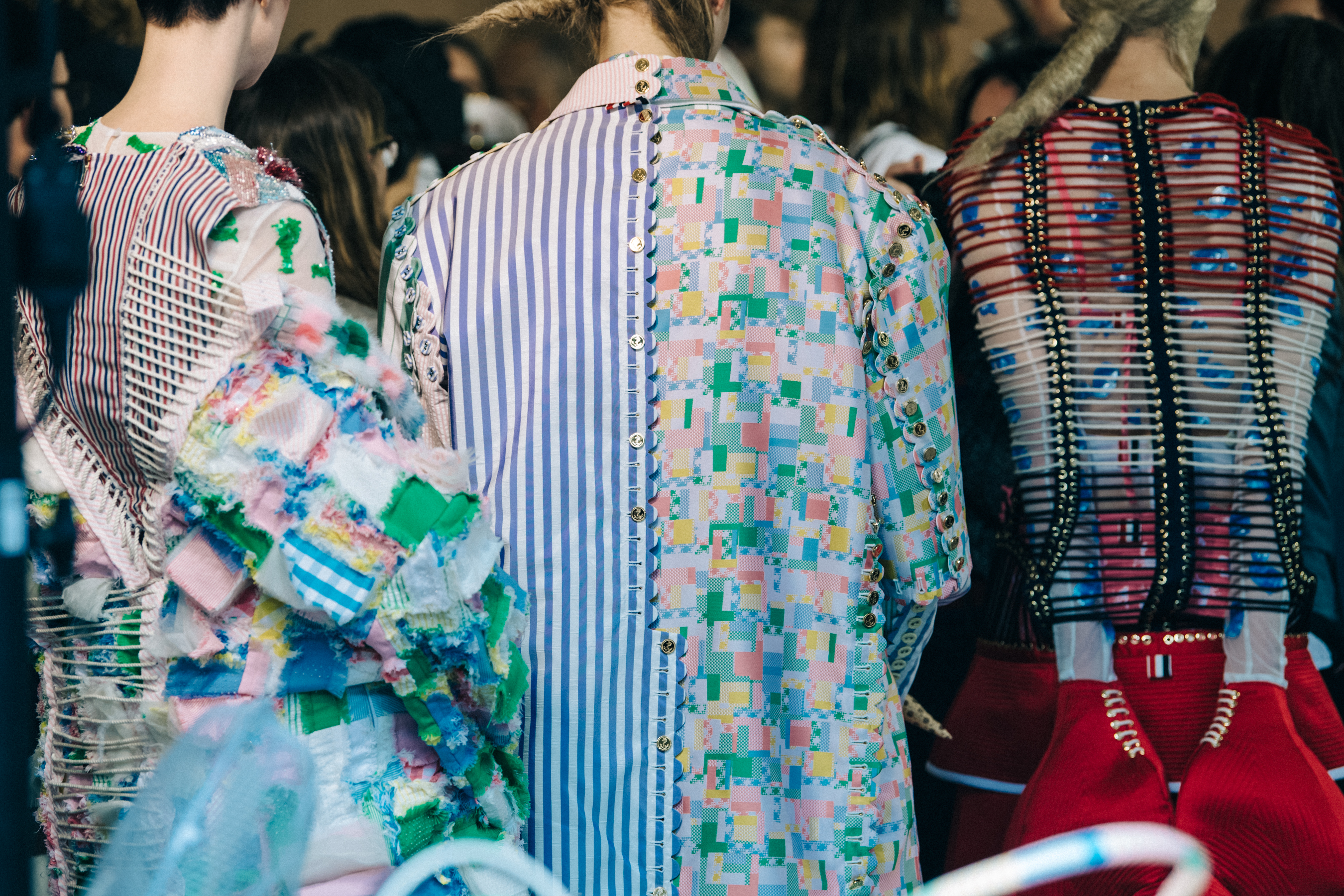 Models wearing colourful Thom Browne suits