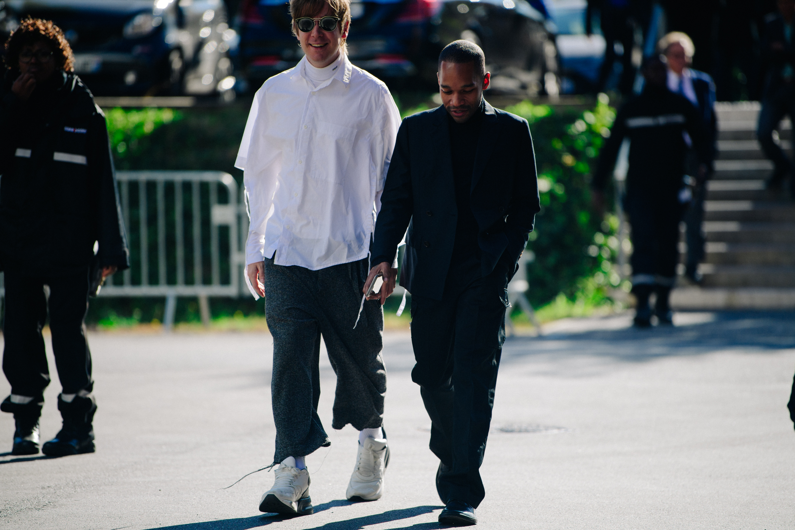 Two men wearing black and white