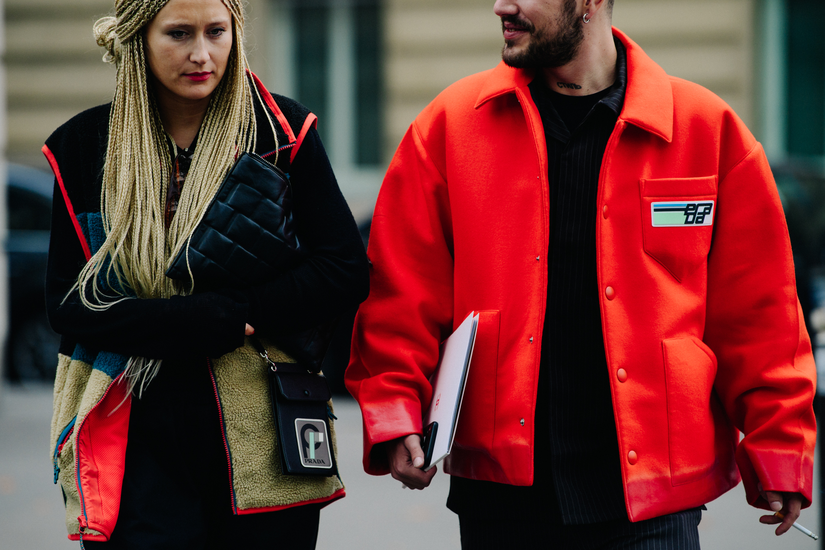 Couple wearing Prada outfits