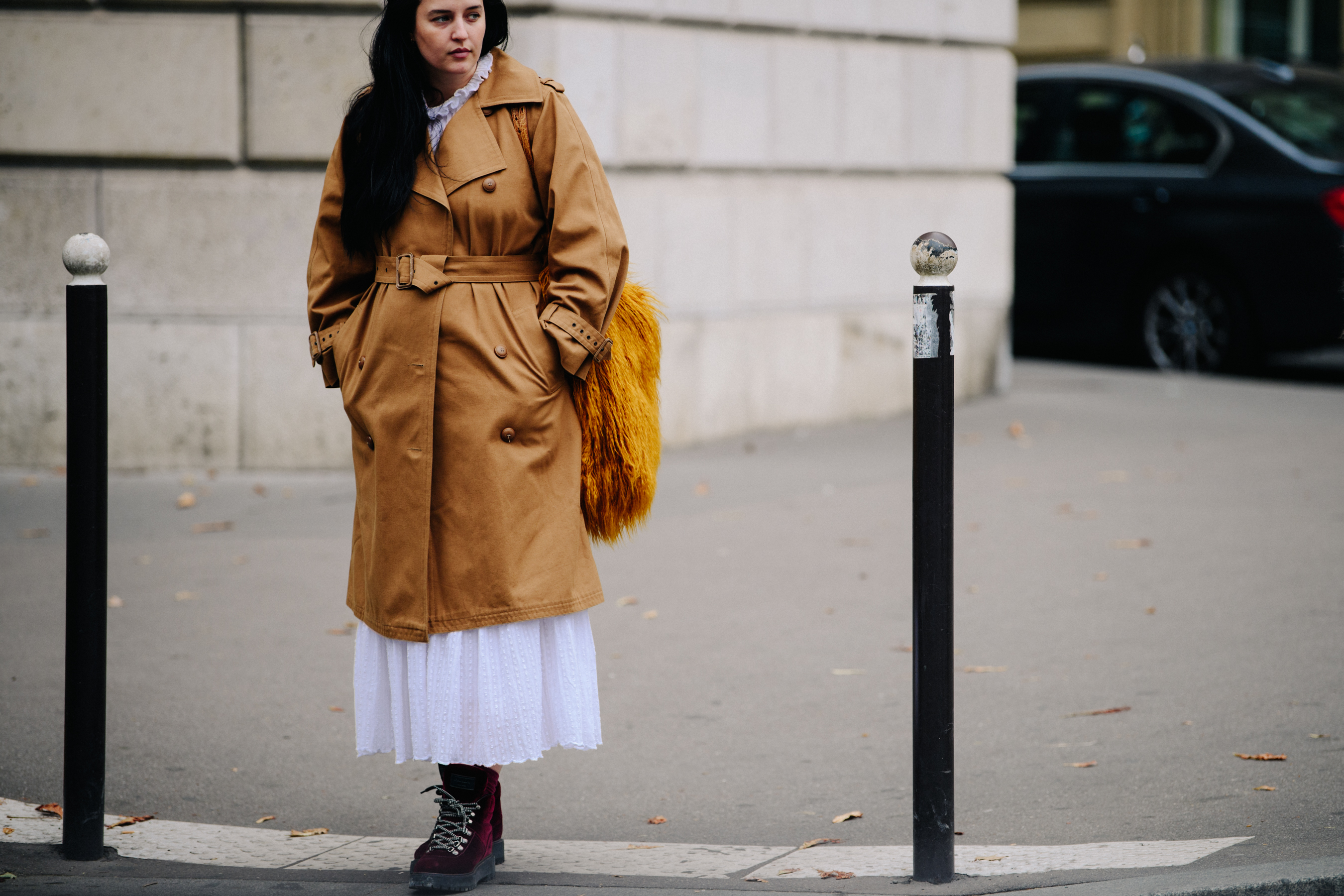 Woman wearing dark tan coat